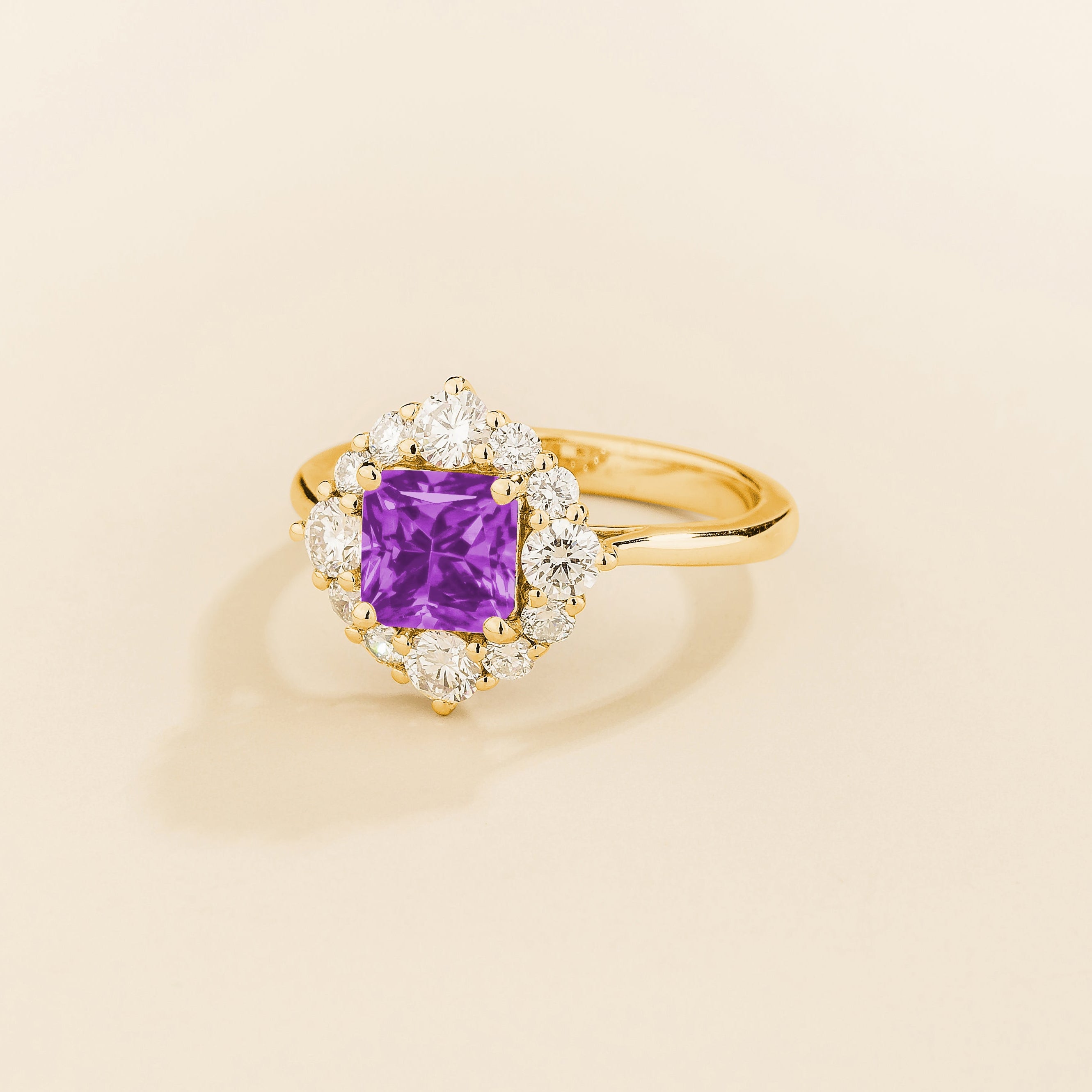 Angled view of the cushion purple sapphire on the Tuli ring in gold, Juvetti jewellery