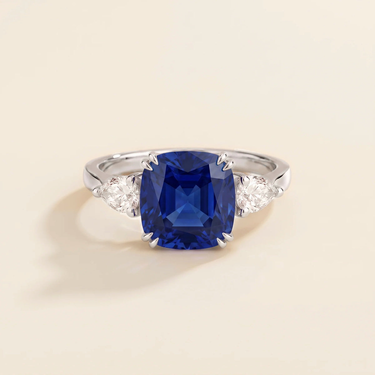 Roue Blue Sapphire Cushion Cut & Diamond Pear Cut White Gold Ring front