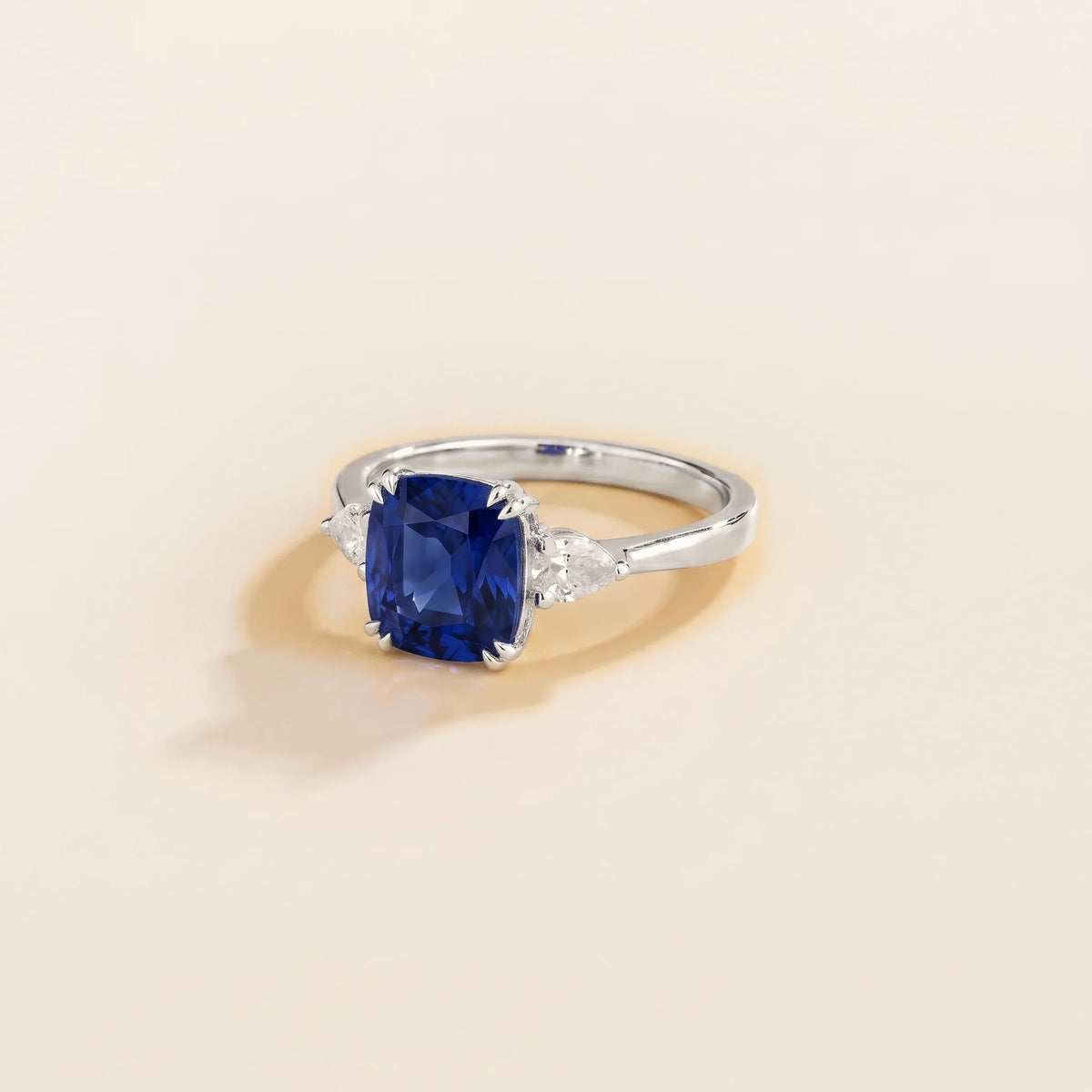 Roue Blue Sapphire Cushion Cut & Diamond Pear Cut White Gold Ring three quarters