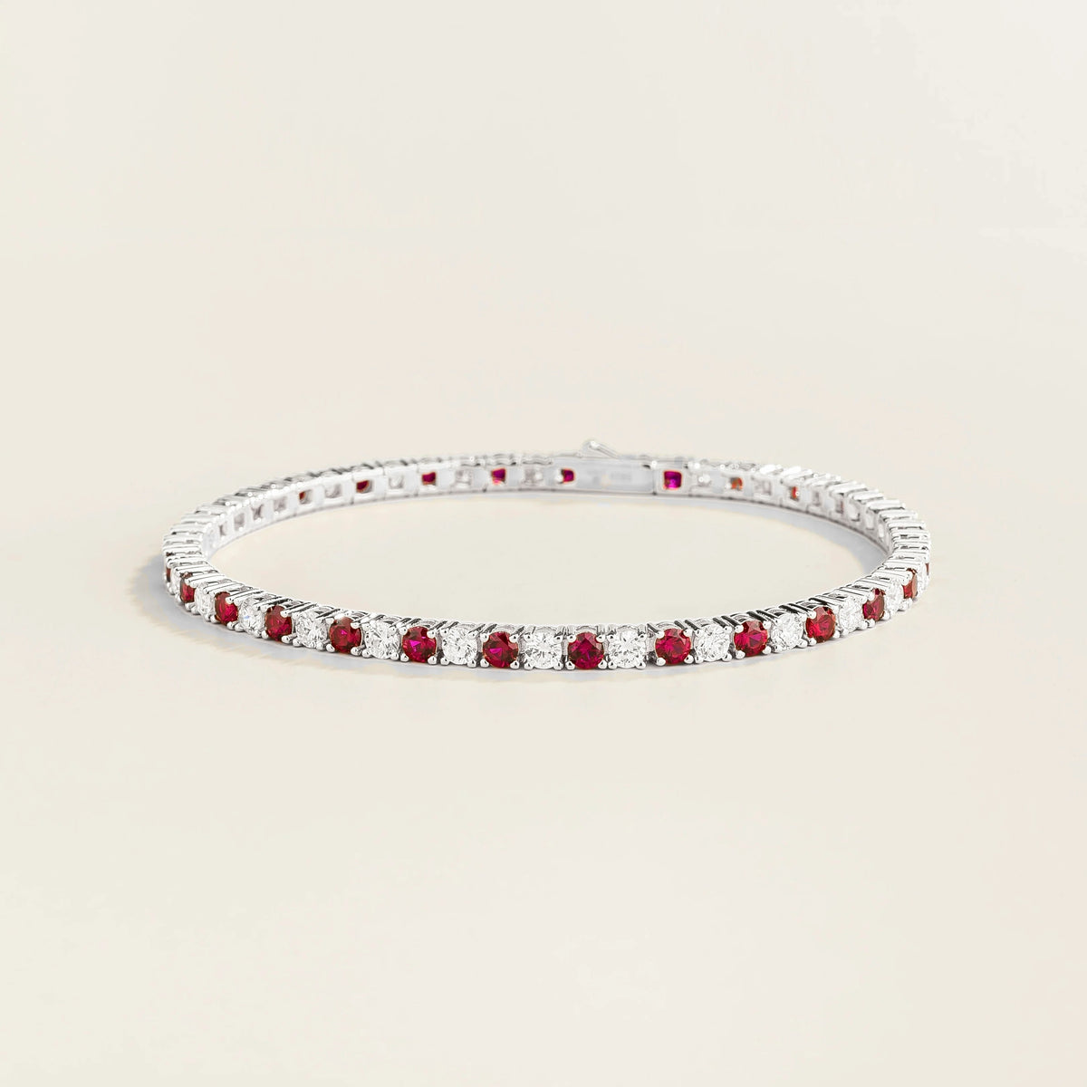 Round lab-grown ruby and diamond tennis bracelet in white gold | Juvetti London