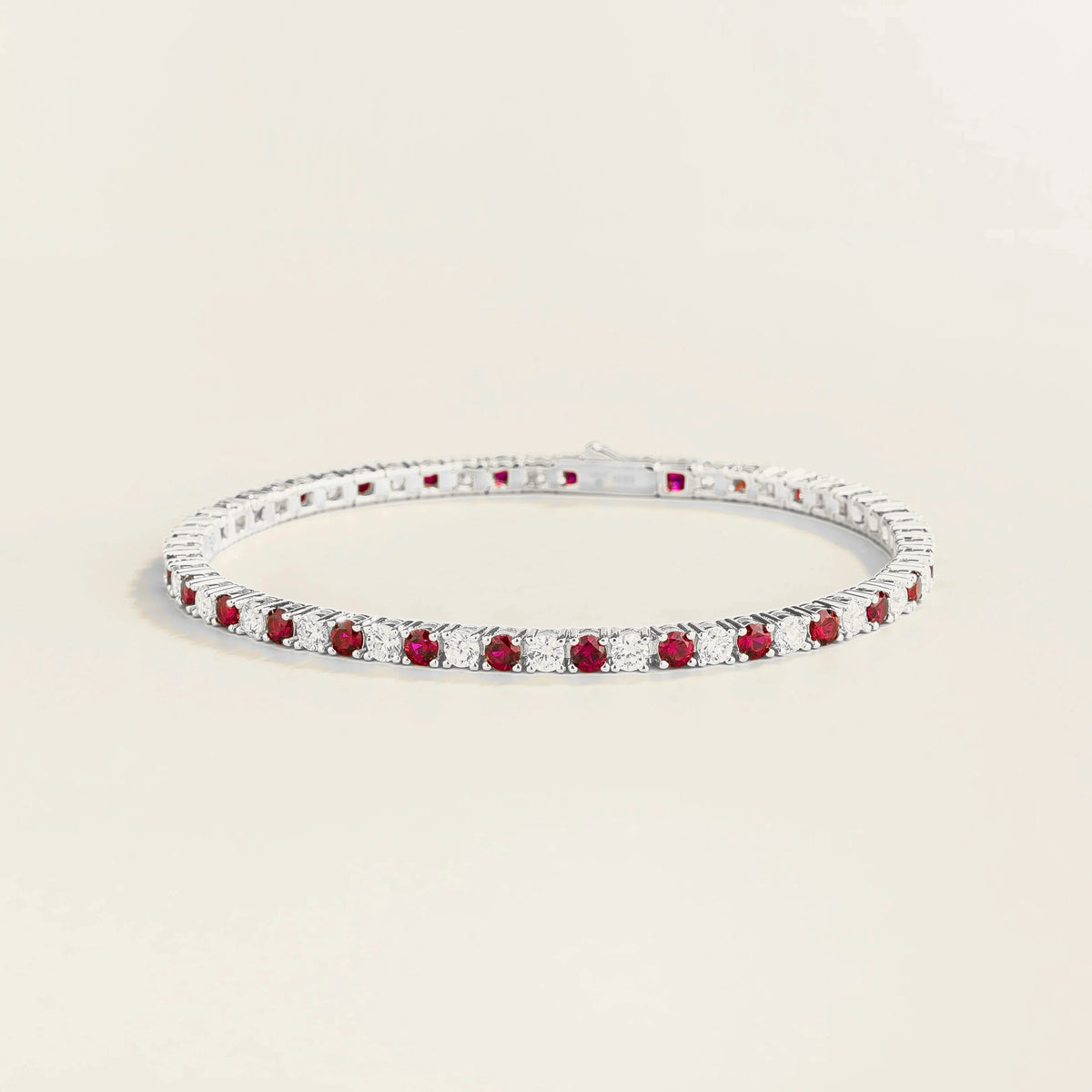 Round lab-grown ruby and diamond tennis bracelet in white gold | Juvetti London