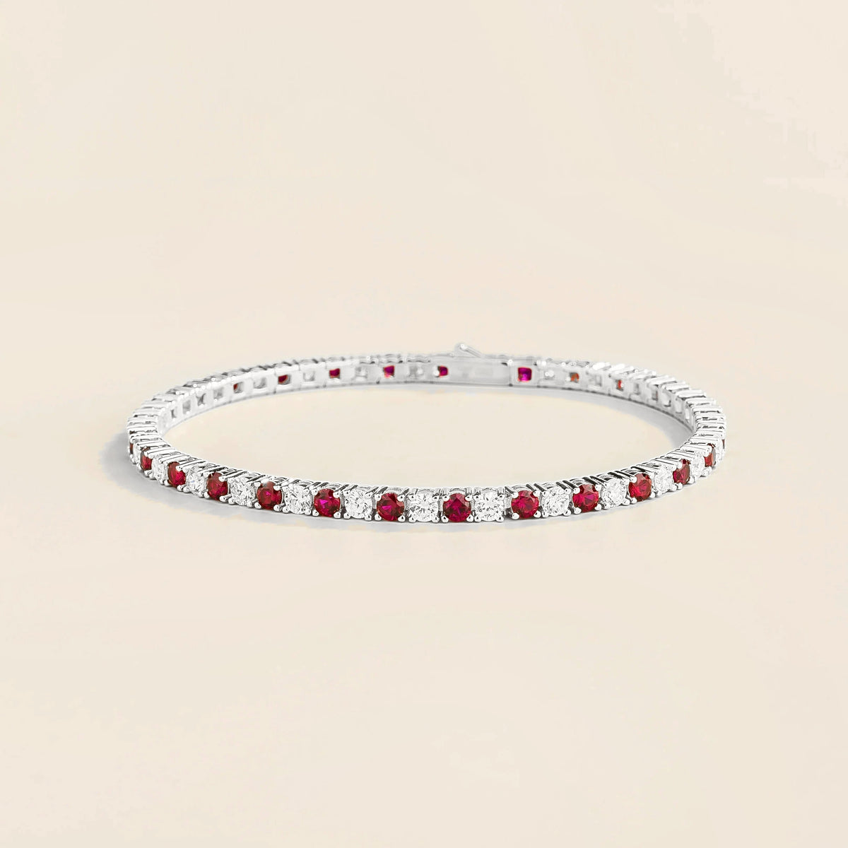 Round lab-grown ruby and diamond tennis bracelet in white gold | Juvetti London