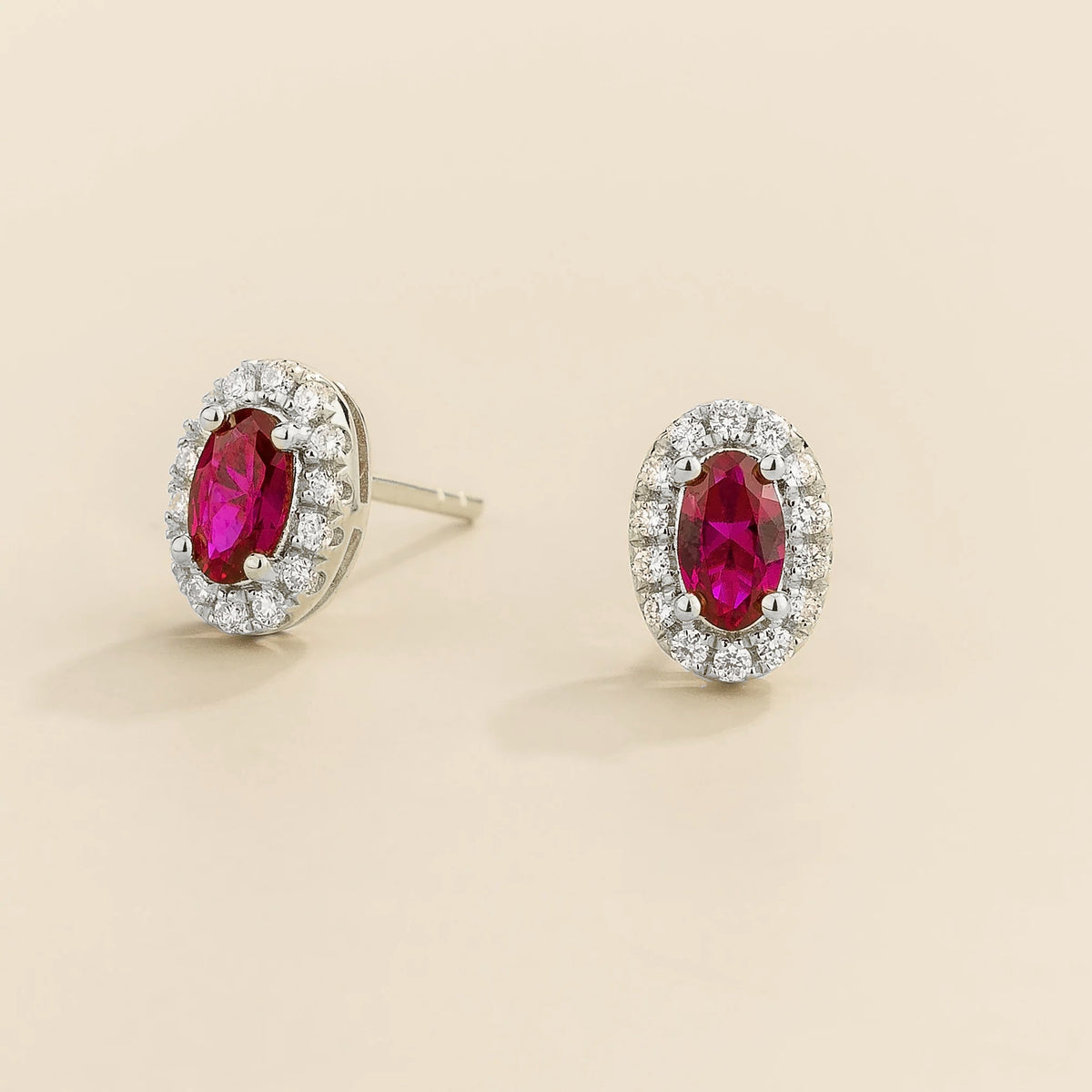 Mini lab-grown ruby and diamond oval halo stud earrings in white gold – side view | Mina by Juvetti