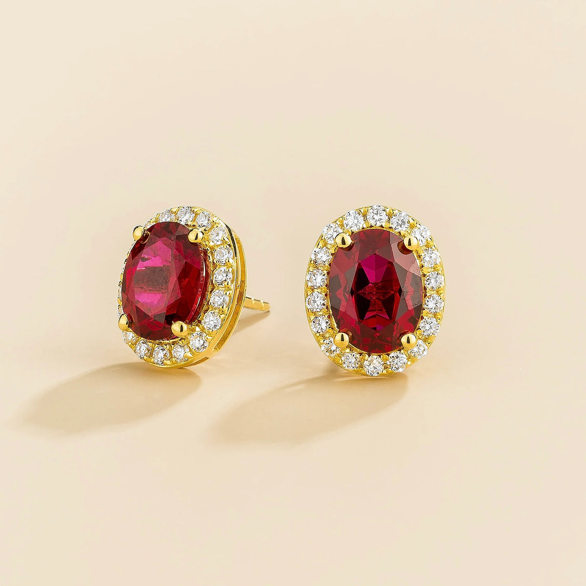 Lab-grown ruby and diamond oval halo stud earrings in gold – side view | Mina by Juvetti
