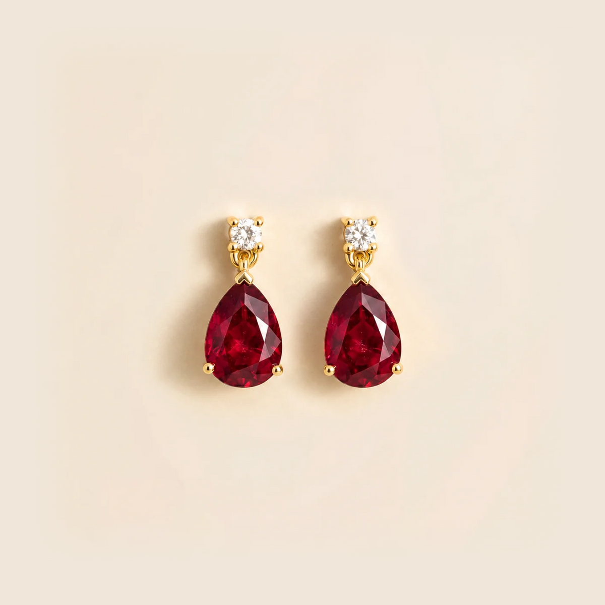 Lab-grown ruby and diamond pear drop earrings in gold – front view | Pisa by Juvetti