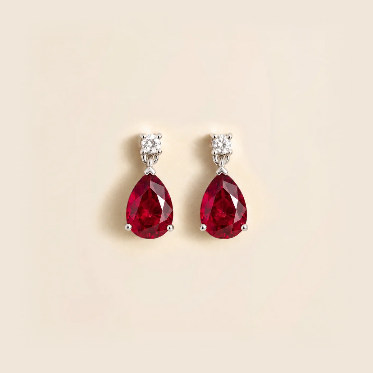 Lab-grown ruby and diamond pear drop earrings in white gold – front view | Pisa by Juvetti