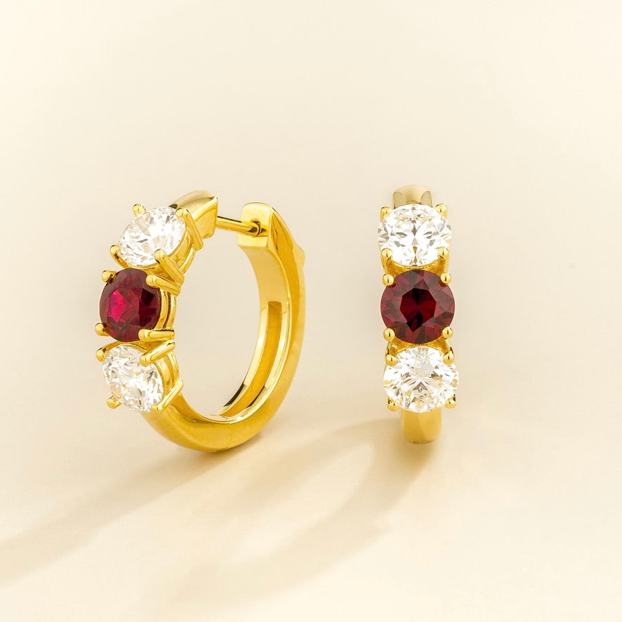 Tres ruby & diamond three-stone huggie hoop earrings in gold