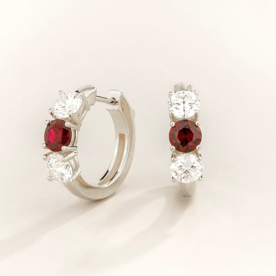 Tres ruby & diamond three-stone huggie hoop earrings in white gold