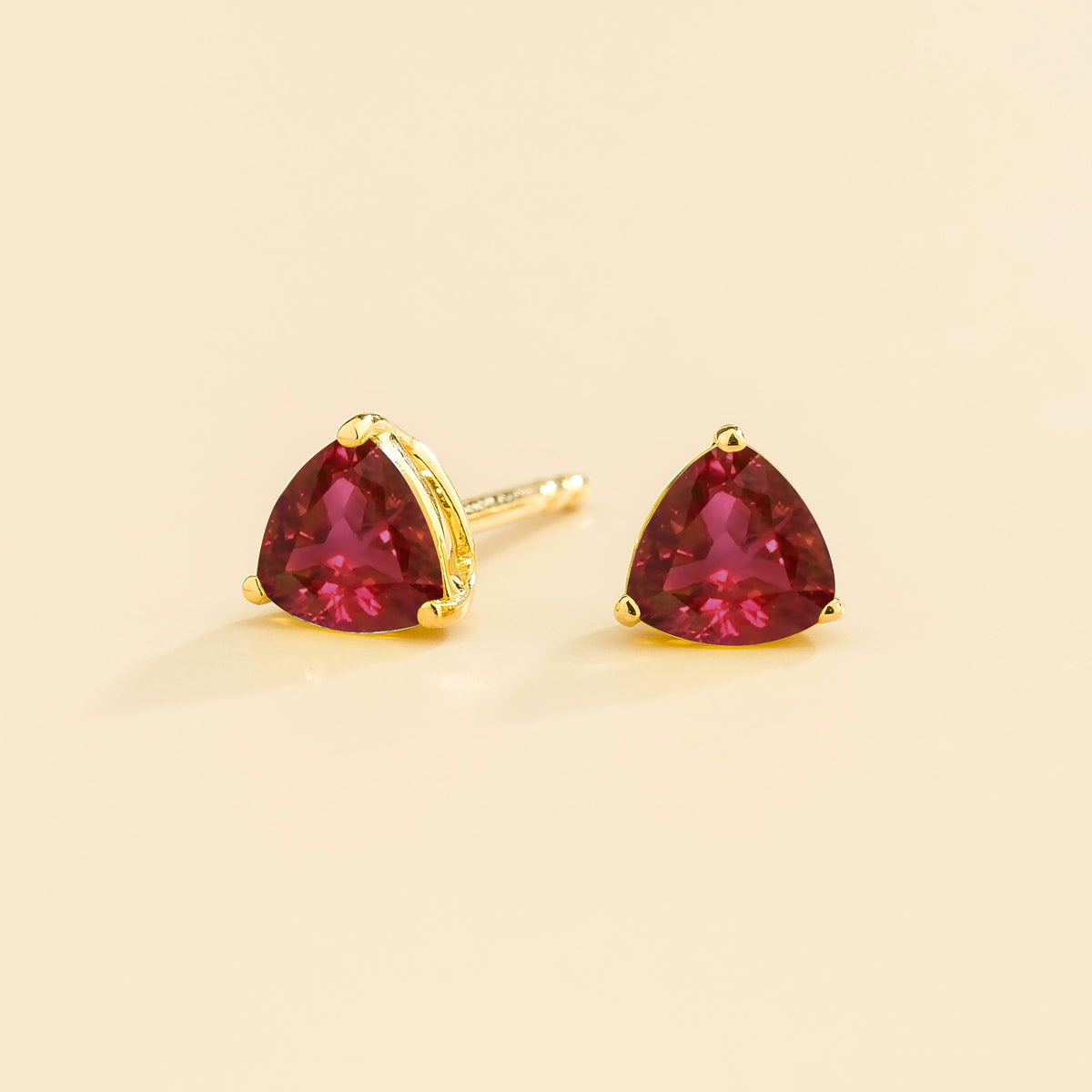 Trillion Ruby Solitaire Stud Earrings in Gold