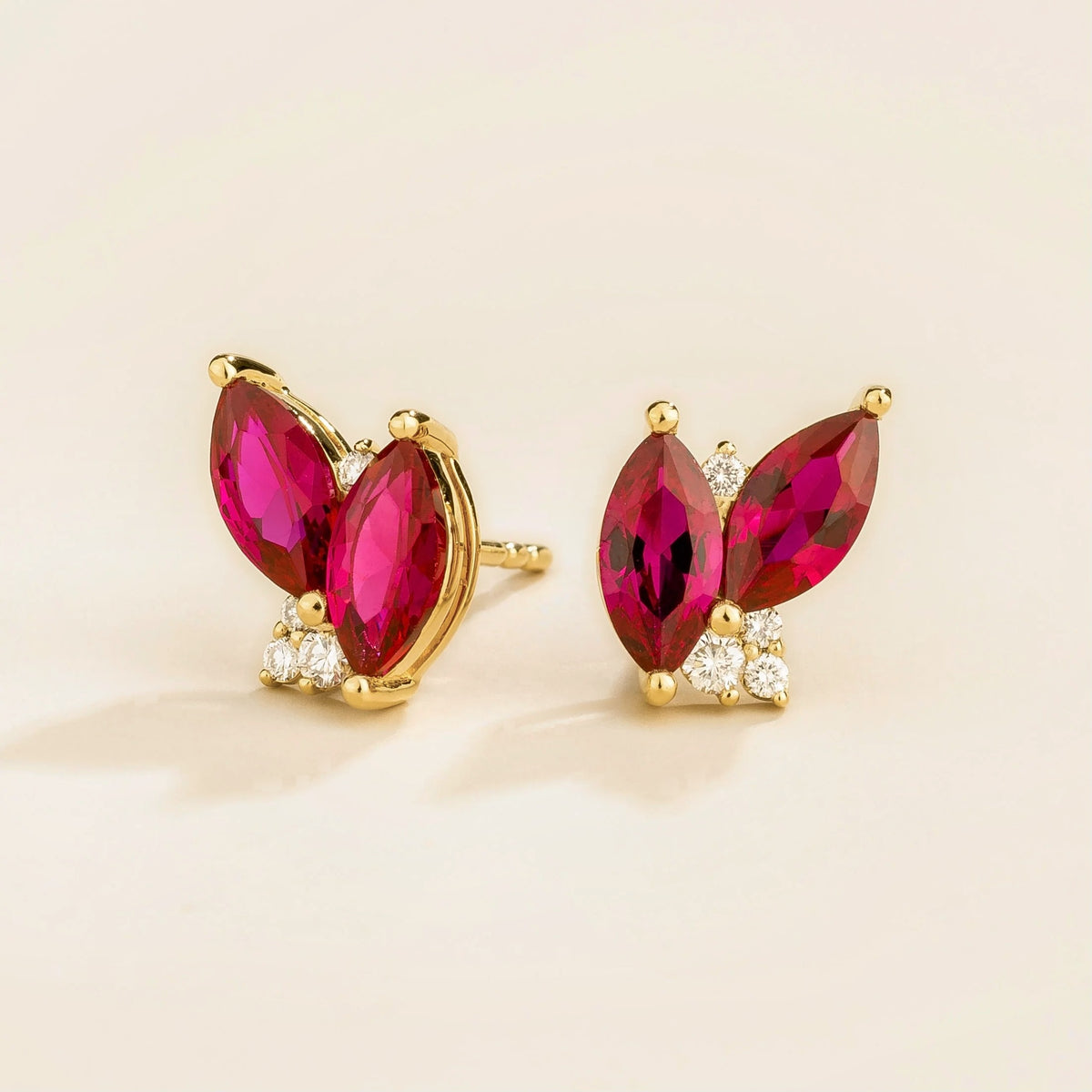 Vento Marquise Ruby & Diamond Cluster Stud Earrings in Gold – angle view