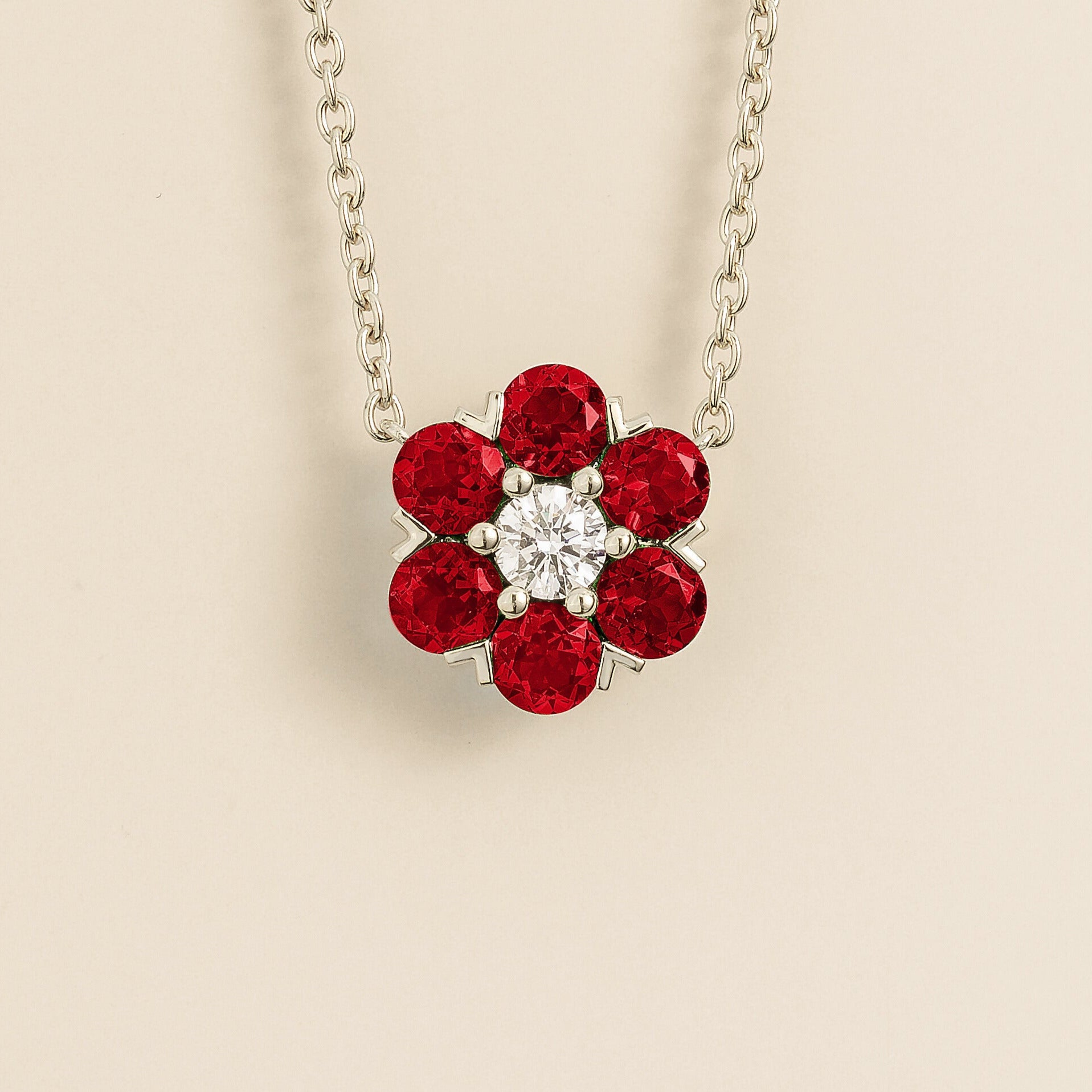 Cinq Ruby & Diamond Flower Pendant Necklace in White Gold by Juvetti, bespoke jewellery London