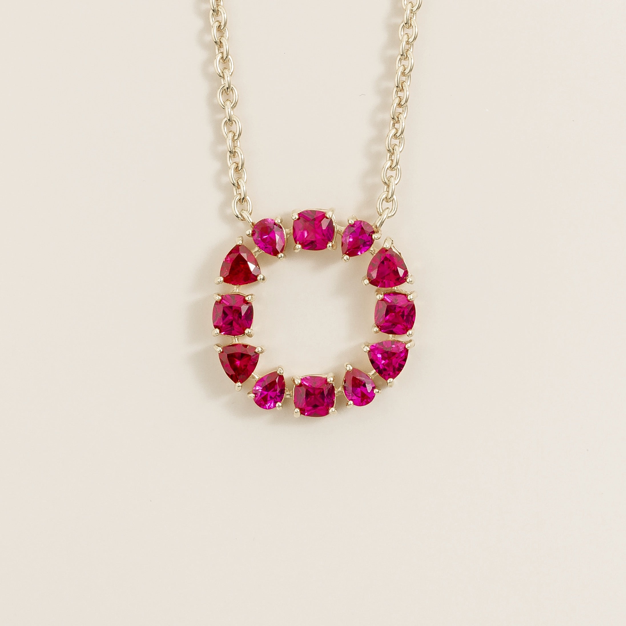 Glorie Ruby Circle Pendant Necklace in White Gold by Juvetti London