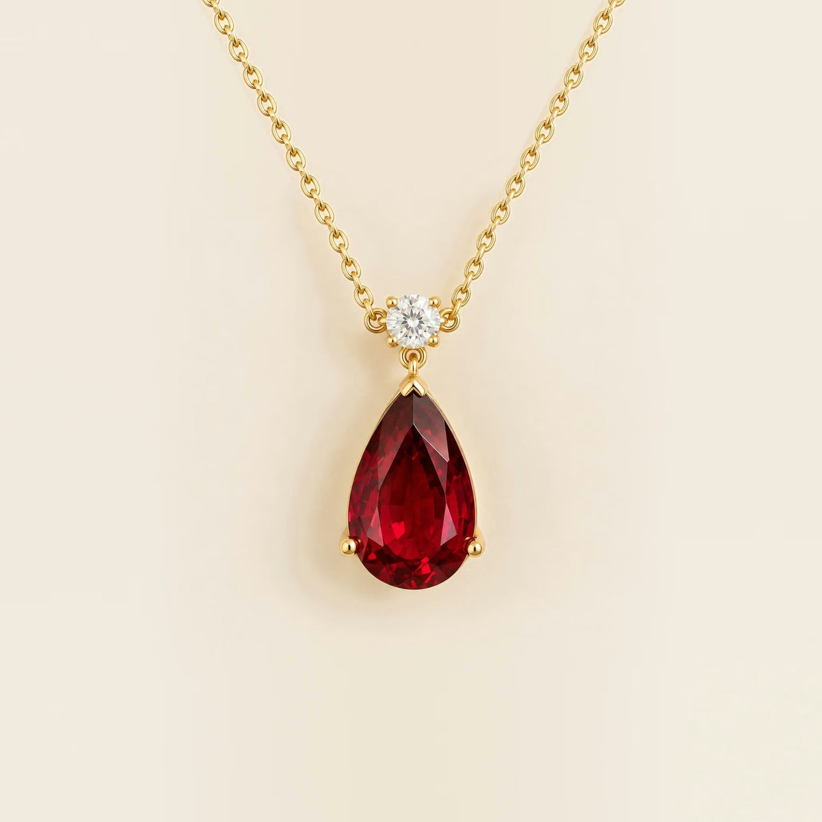 Lab-grown ruby and diamond pear drop pendant necklace in gold, large – front view | Pisa by Juvetti