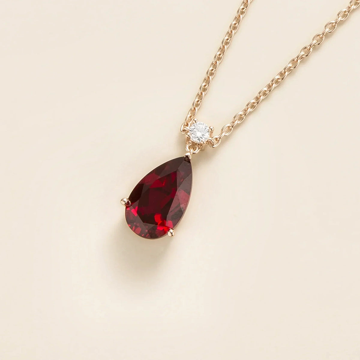 Lab-grown ruby and diamond pear drop pendant necklace in rose gold, large – front view | Pisa by Juvetti