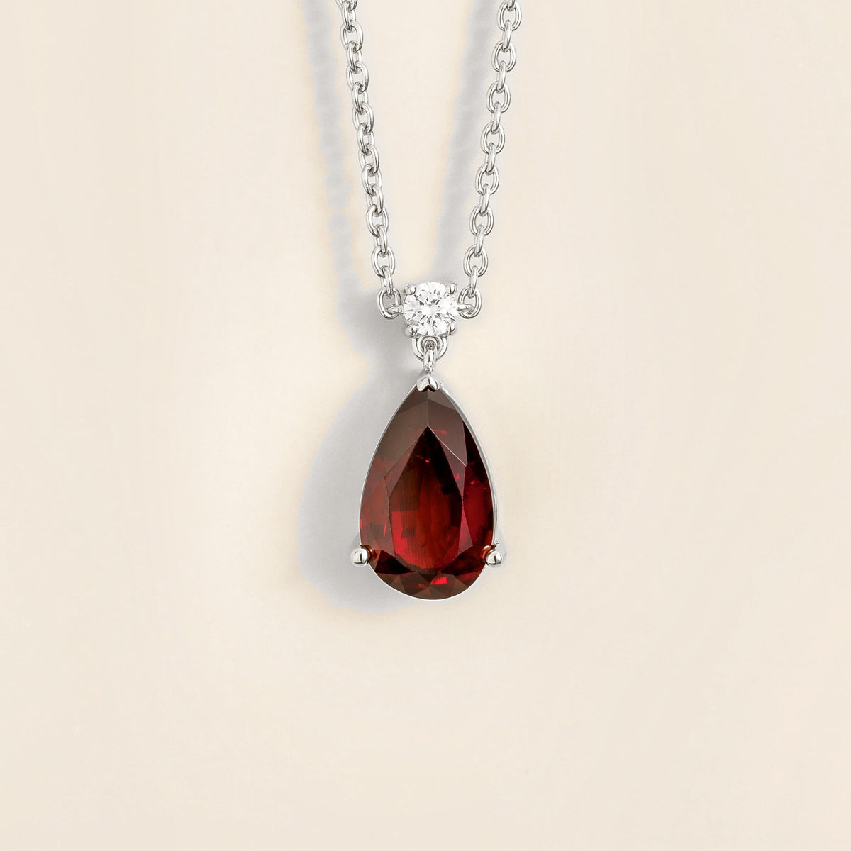 Lab-grown ruby and diamond pear drop pendant necklace in white gold, large – front view | Pisa by Juvetti