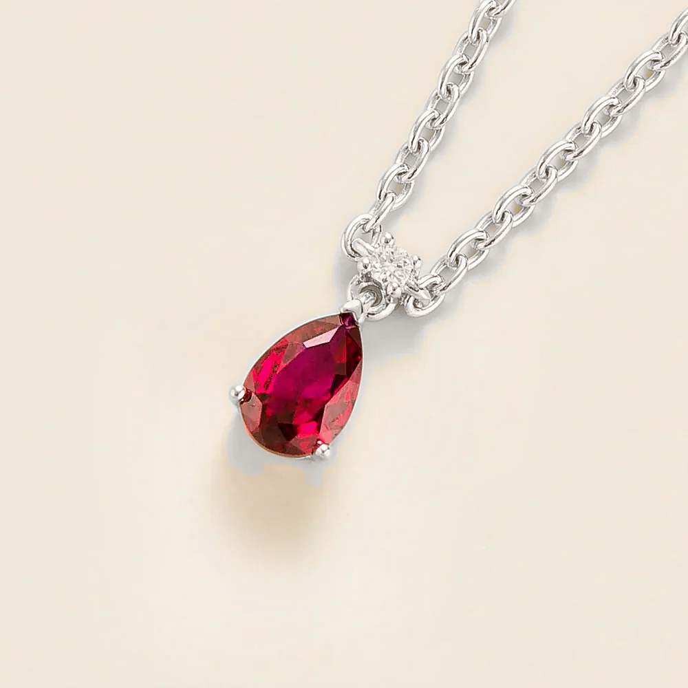 Lab-grown ruby and diamond pear drop pendant necklace in white gold, small – angled view | Pisa by Juvetti