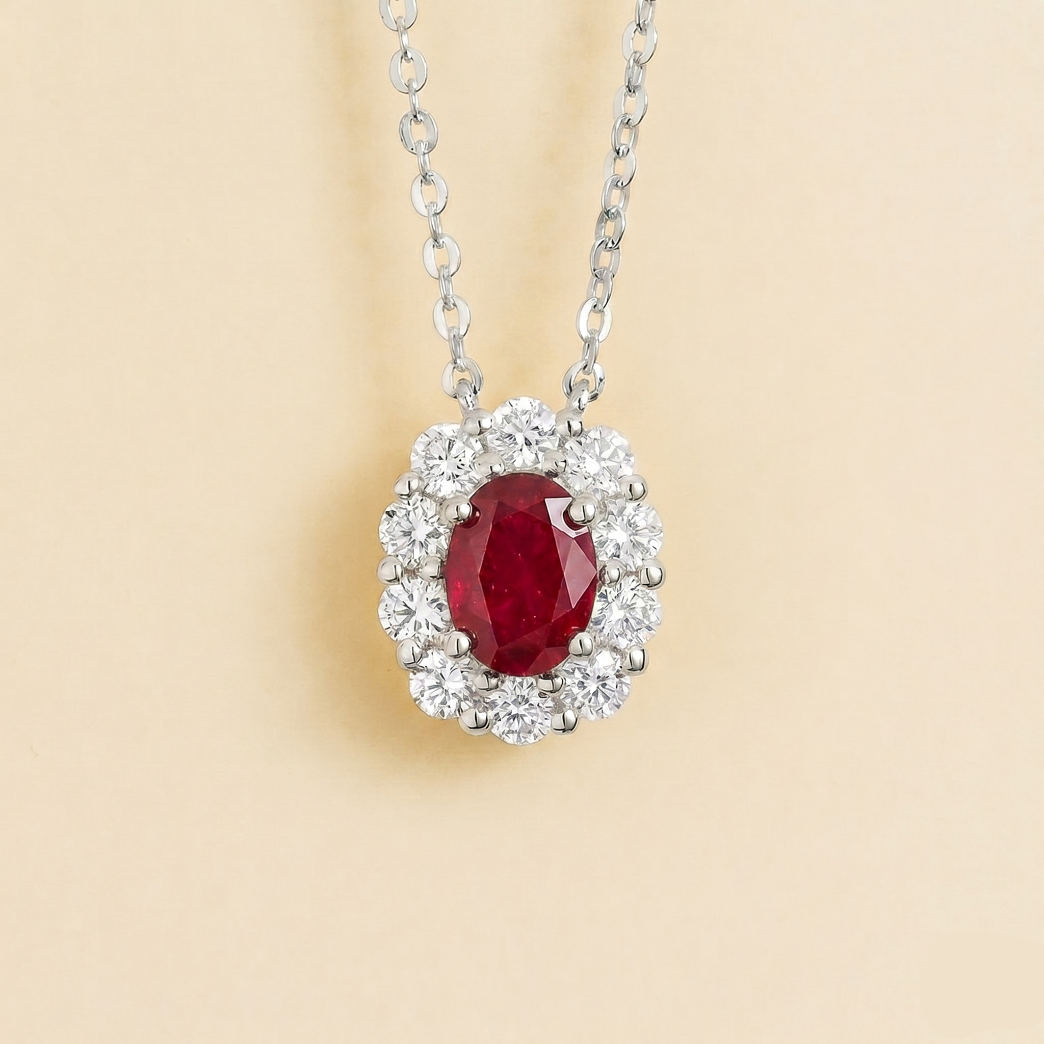 Prill Ruby Oval & Diamond Halo Necklace In White Gold by Juvetti London