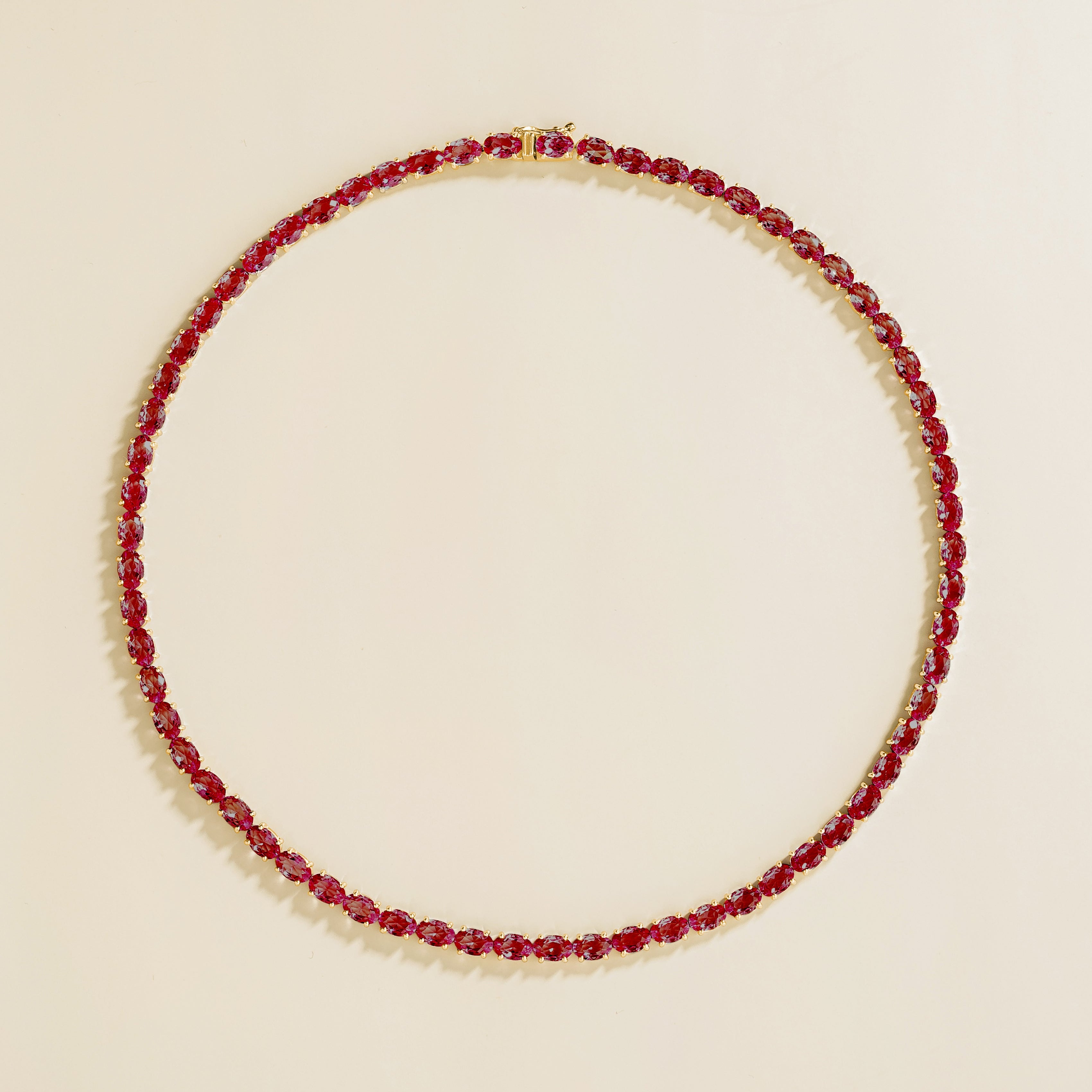 Salto Ruby Oval Tennis Necklace in Gold by Juvetti, bespoke jewellery London