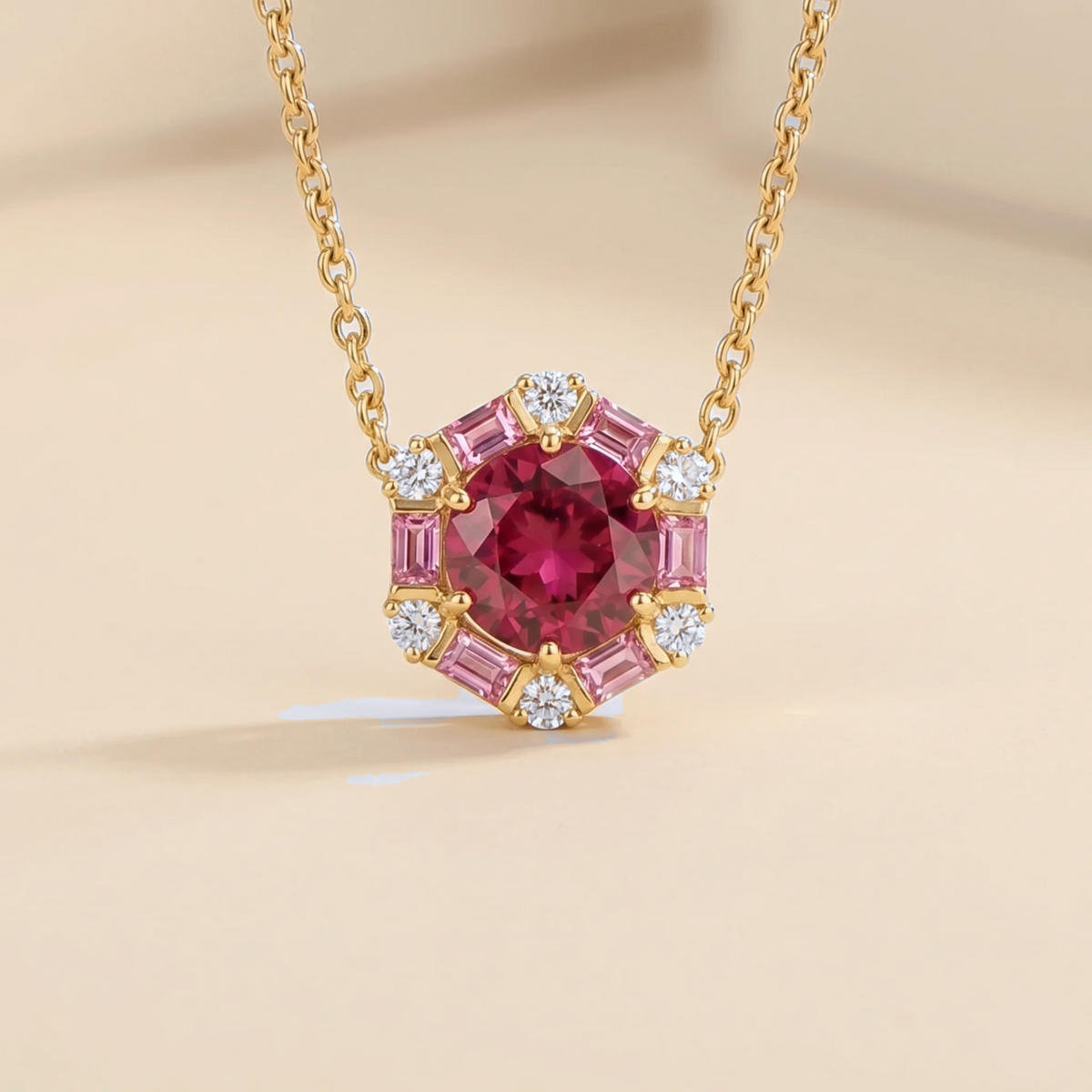 Hexagon halo lab-grown ruby, pink sapphire and diamond pendant necklace, Melba design in gold | Juvetti London