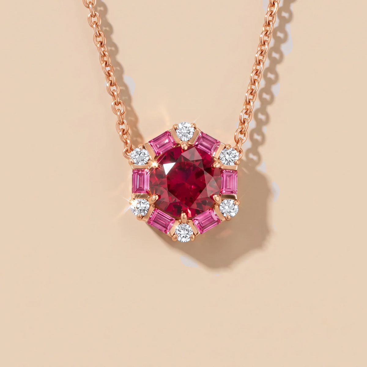 Hexagon halo lab-grown ruby, pink sapphire and diamond pendant necklace, Melba design in rose gold | Juvetti London