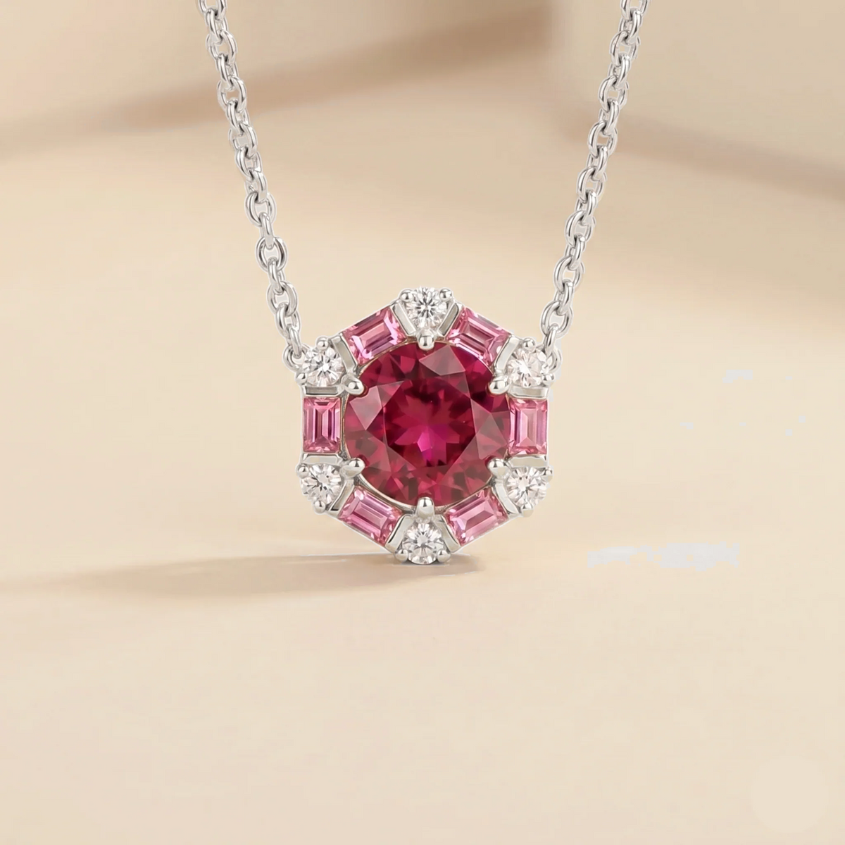 Hexagon halo lab-grown ruby, pink sapphire and diamond pendant necklace, Melba design in white gold | Juvetti London