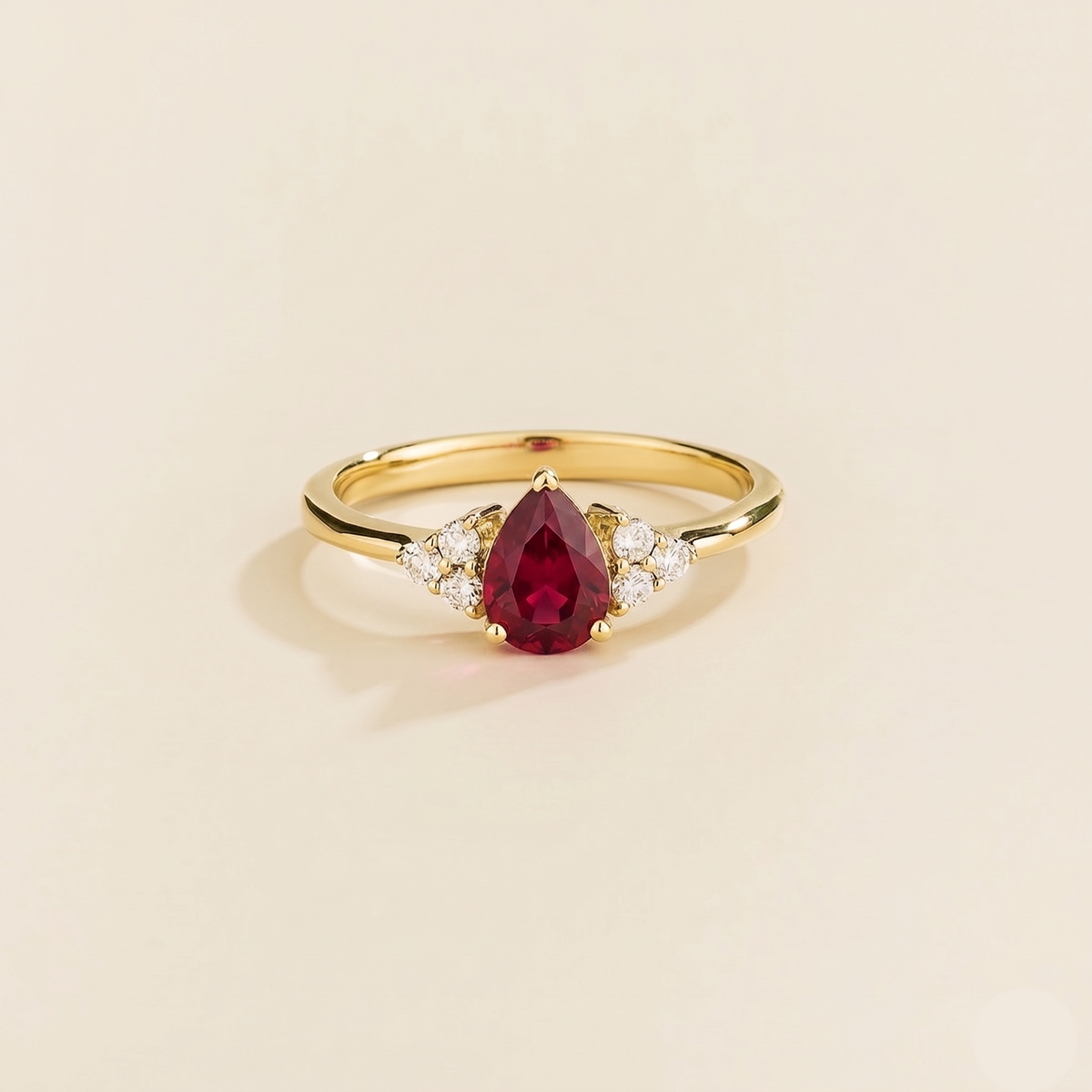Pear-cut lab-grown ruby and diamond ring in gold – front view | Pisa by Juvetti