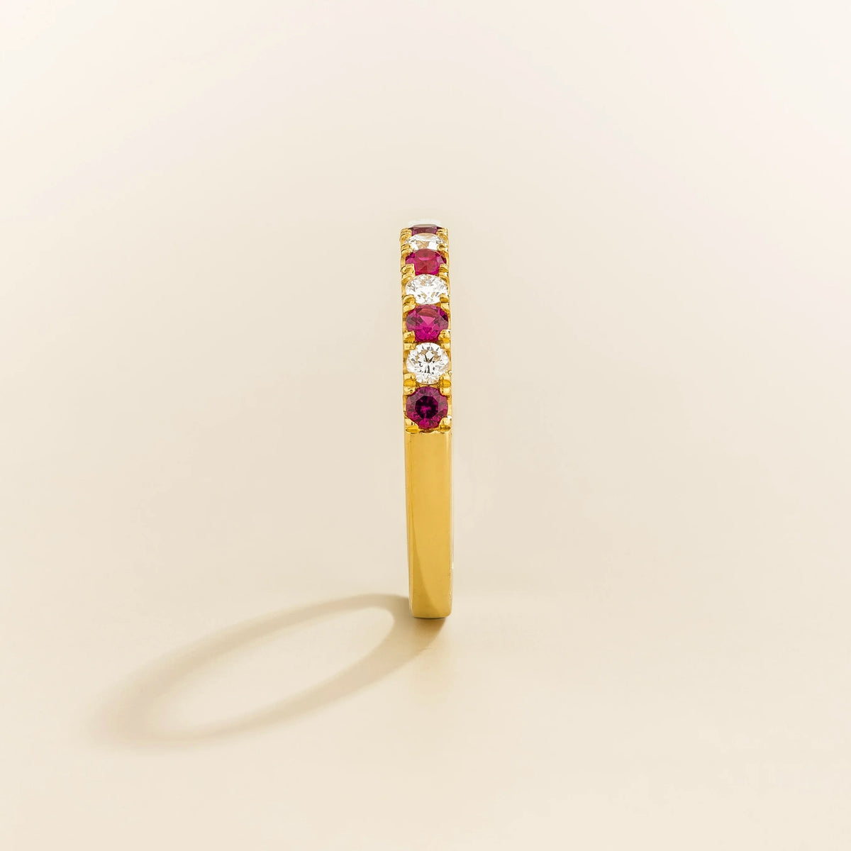 Salto Ruby & Diamond Half Eternity Ring in Gold worn on hand