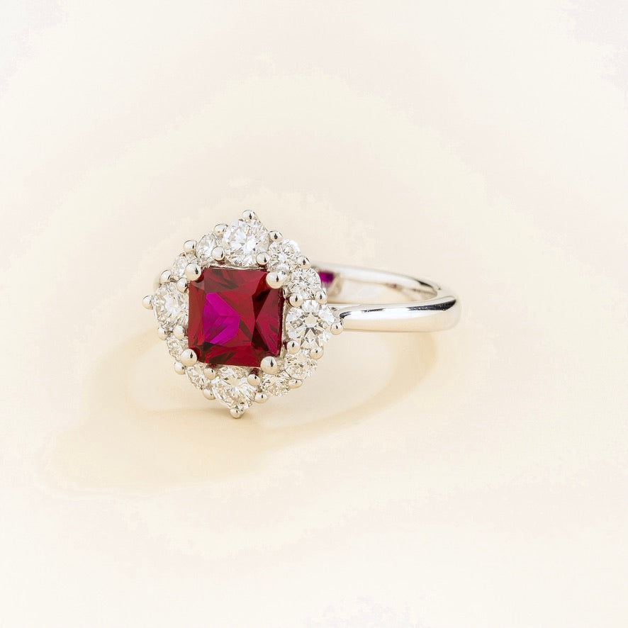 Tuli cushion-cut lab-grown ruby and diamond halo ring in white gold – angle view | Juvetti London