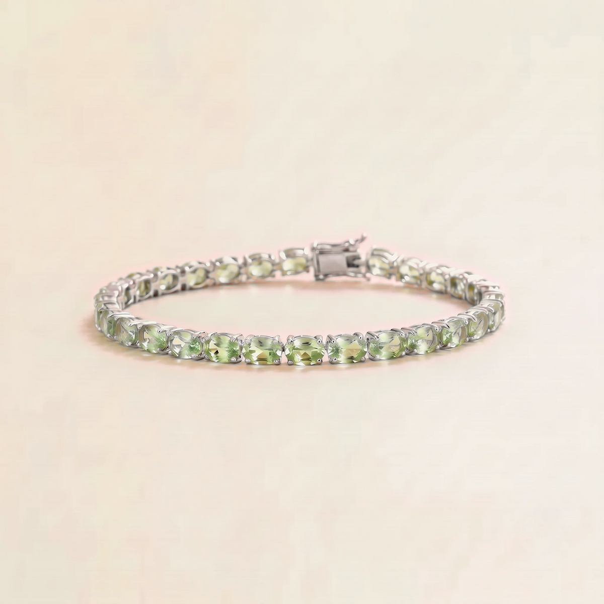 Salto green sapphire oval tennis bracelet in white gold | Juvetti