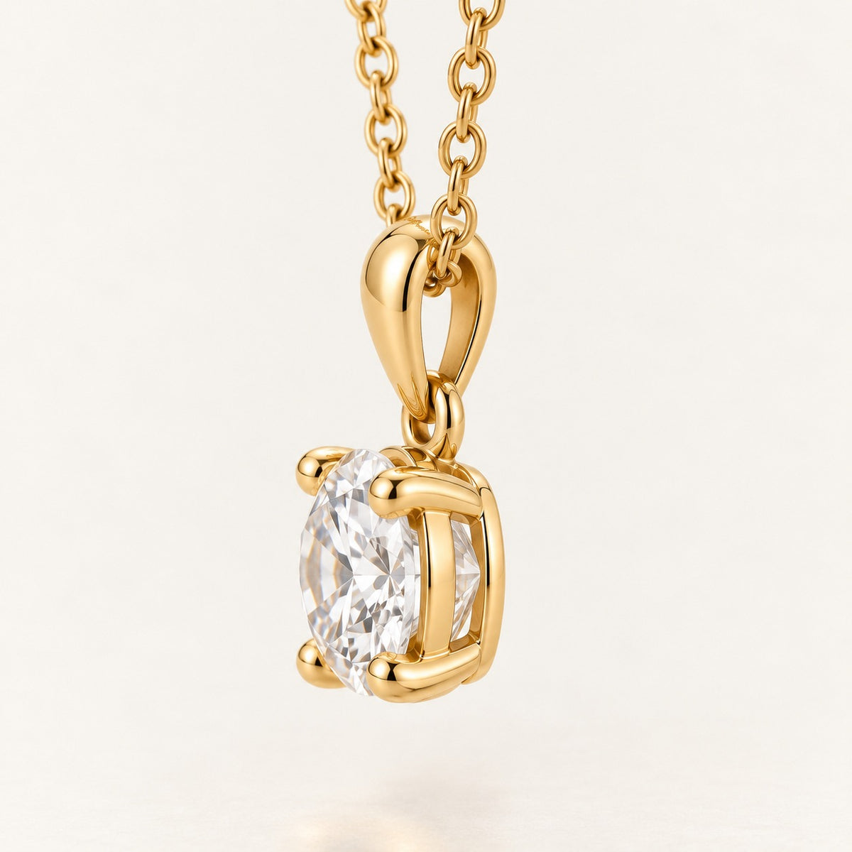 Side view of the solitaire pendant setting on its chain
