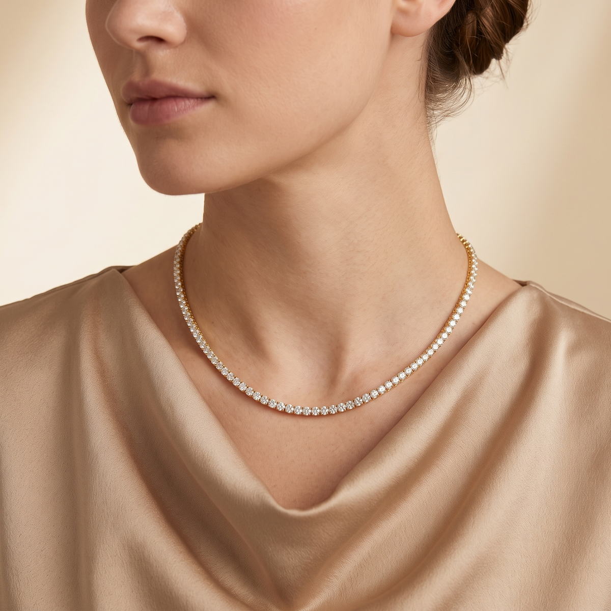 Model wearing Stacy diamond round tennis necklace in gold