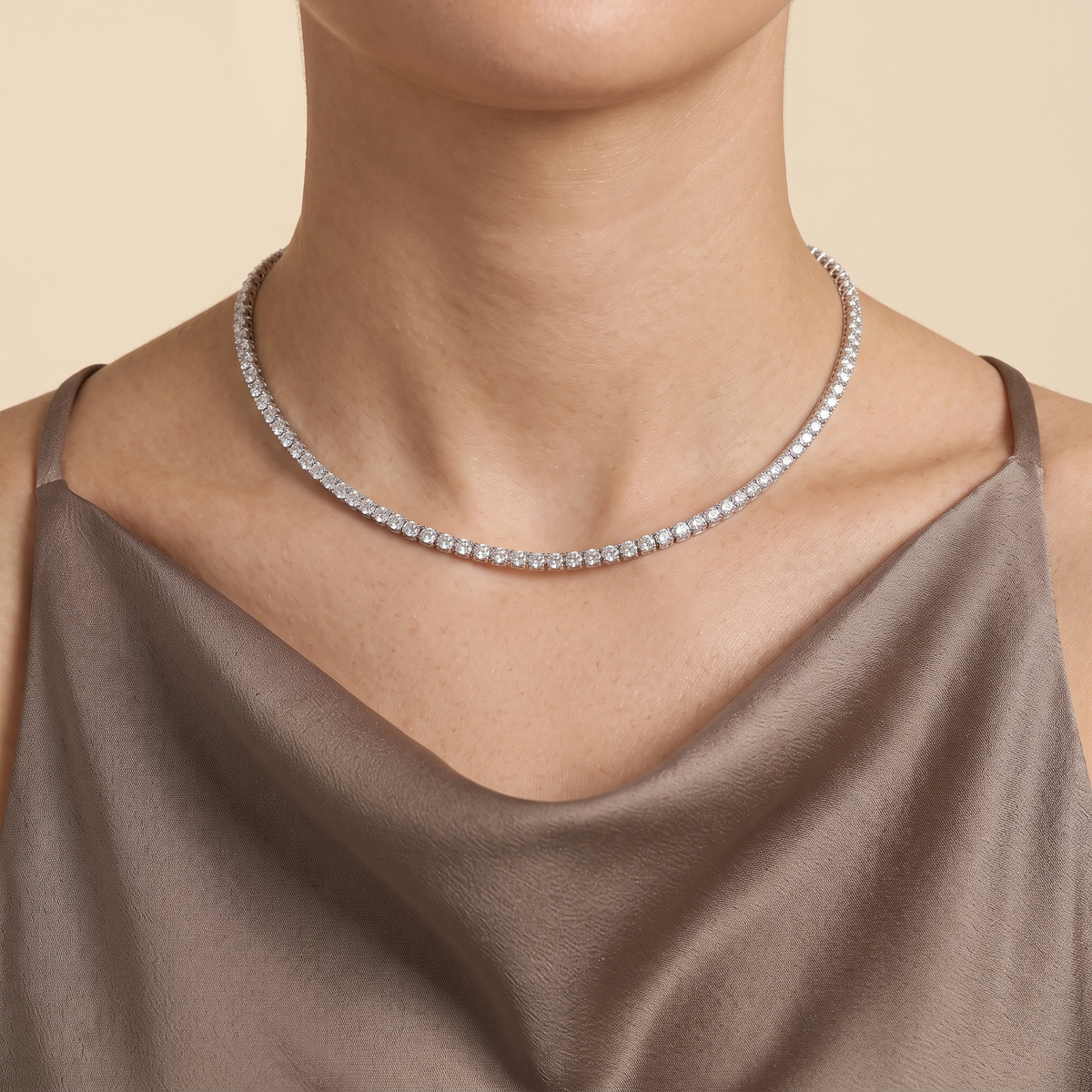 Model wearing Stacy diamond round tennis necklace in white gold