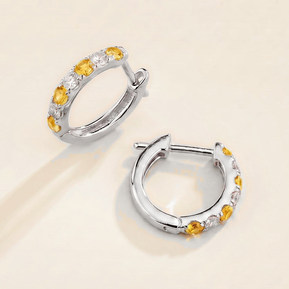 Stacy Yellow Sapphire & Diamond Huggie Hoop Earrings in white Gold | Juvetti