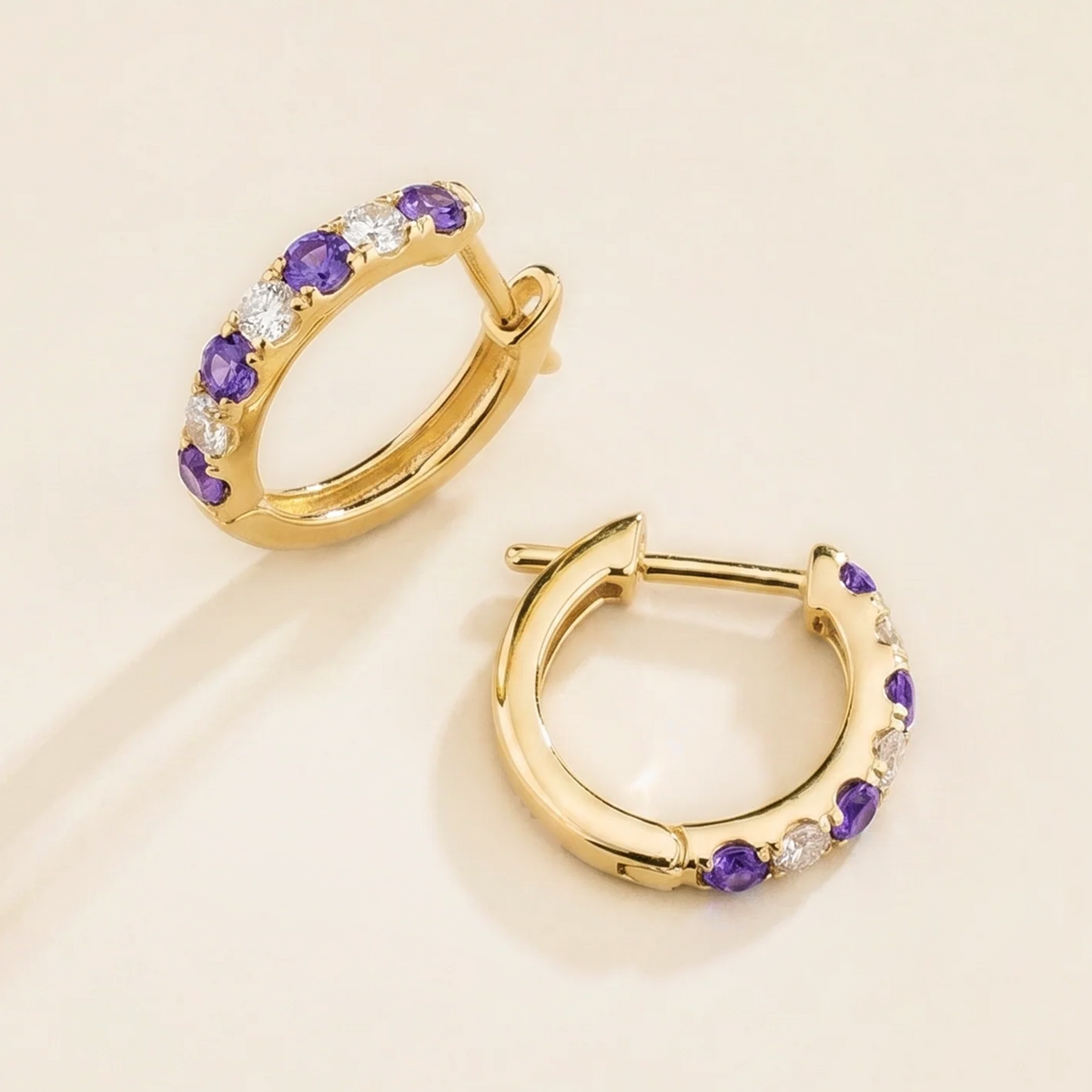 Stacy Purple Sapphire & Diamond Huggie Hoop Earrings in Gold – angle view