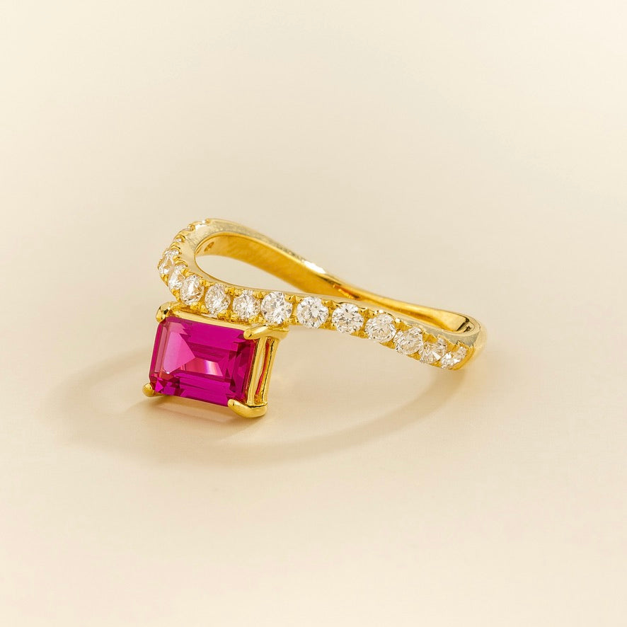 Luno vivid hot pink sapphire emerald-cut ring with diamond pavé in gold, lab-grown sapphire set east-west, top view | Juvetti London