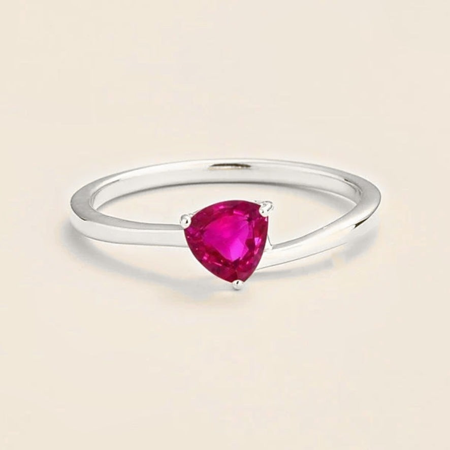 Trillion vivid pink sapphire solitaire ring in white gold