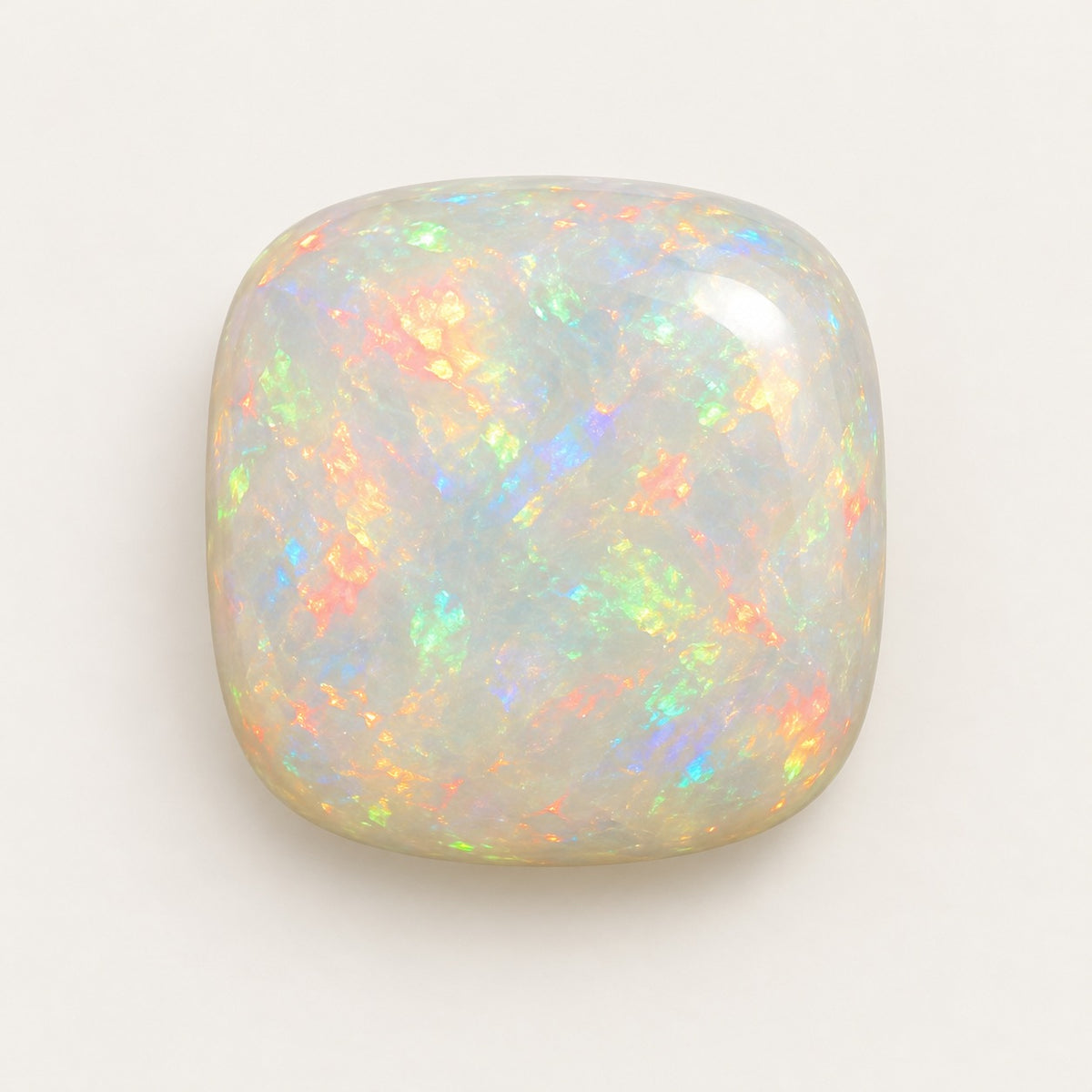 White lab-grown opal, cushion cabochon