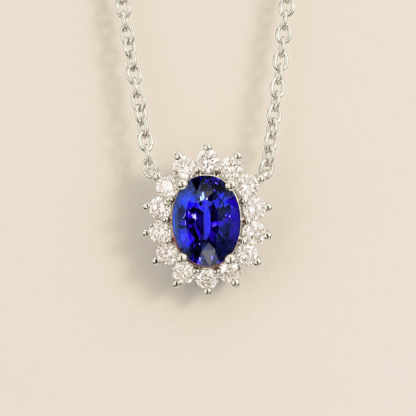 White Gold necklace from Juvetti called divo set in blue sapphire and diamonds.