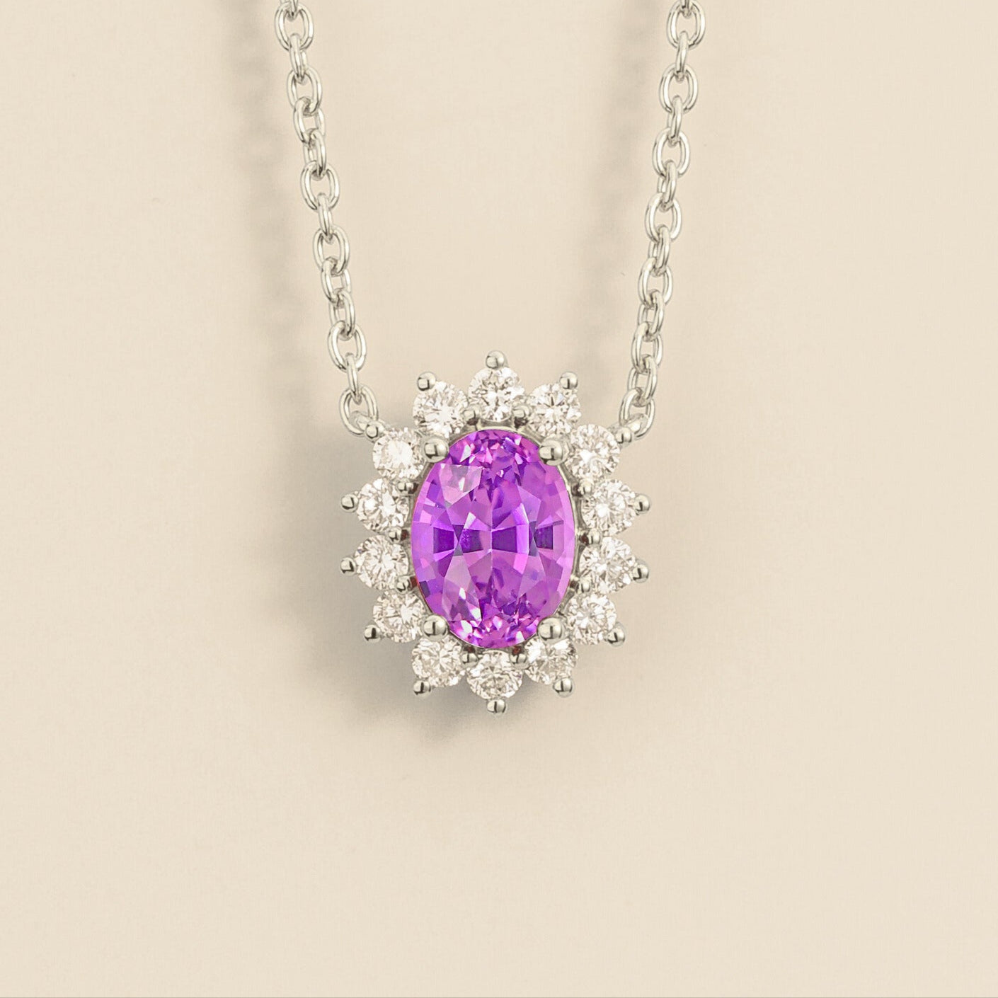 White gold necklace from Juvetti called divo set in purple sapphire and diamonds.