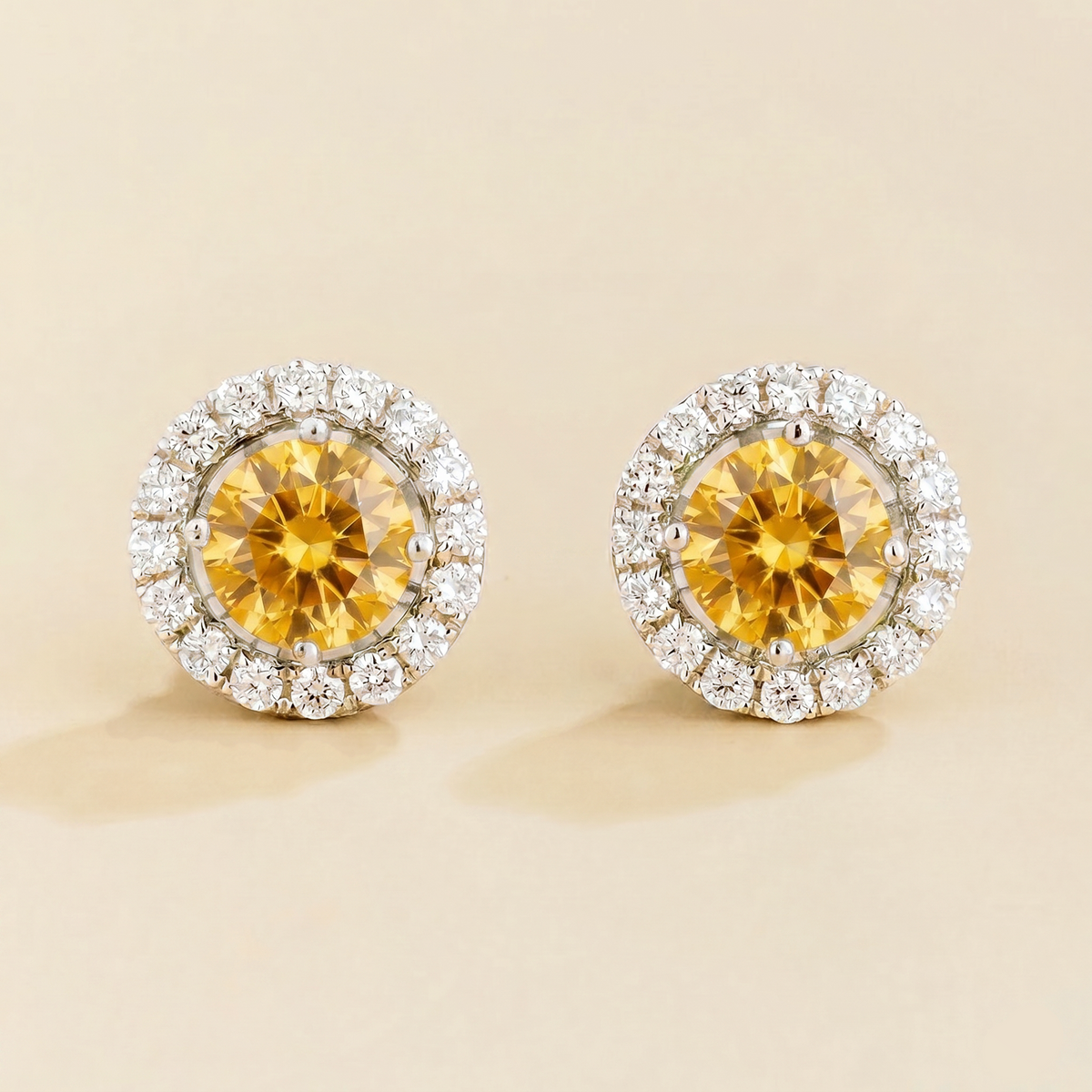 Floret round lab-grown yellow sapphire and diamond halo stud earrings in white gold – front | Juvetti London