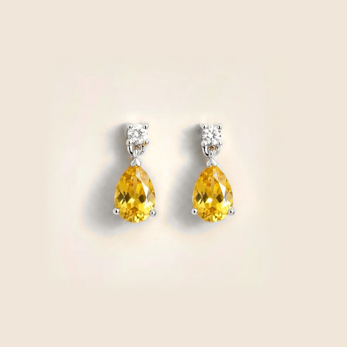 Lab-grown yellow sapphire and diamond pear drop earrings in white gold – front view | Pisa by Juvetti