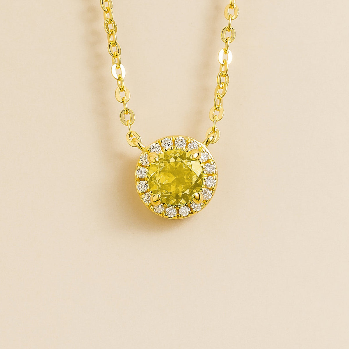 Round lab-grown yellow sapphire and diamond halo Mars necklace in gold | Juvetti London