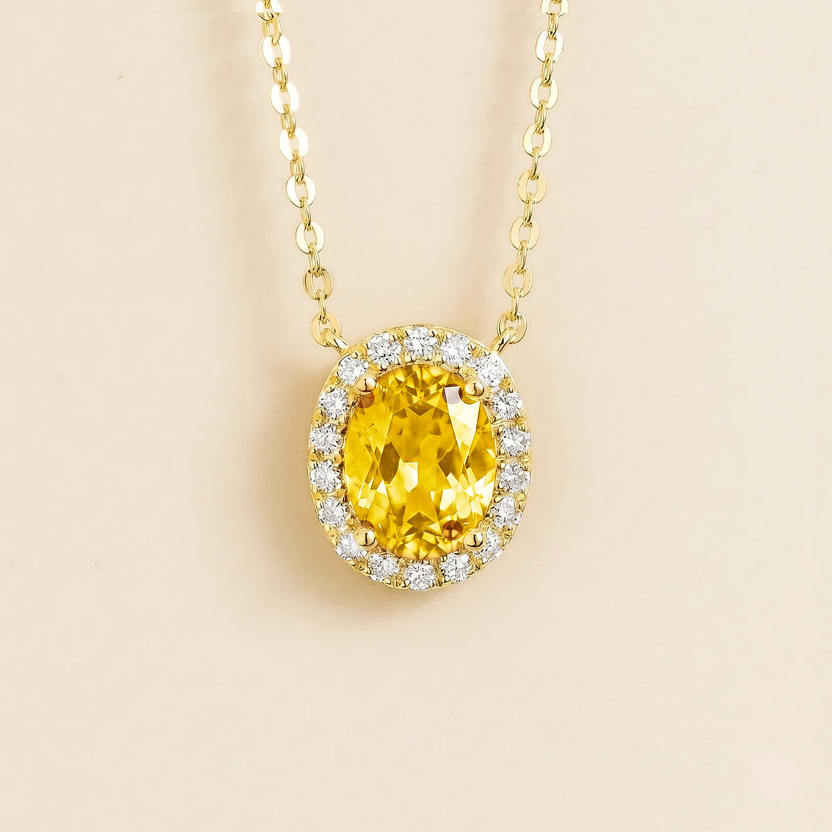 Lab-grown yellow sapphire and diamond oval halo necklace in gold – front view | Mina by Juvetti