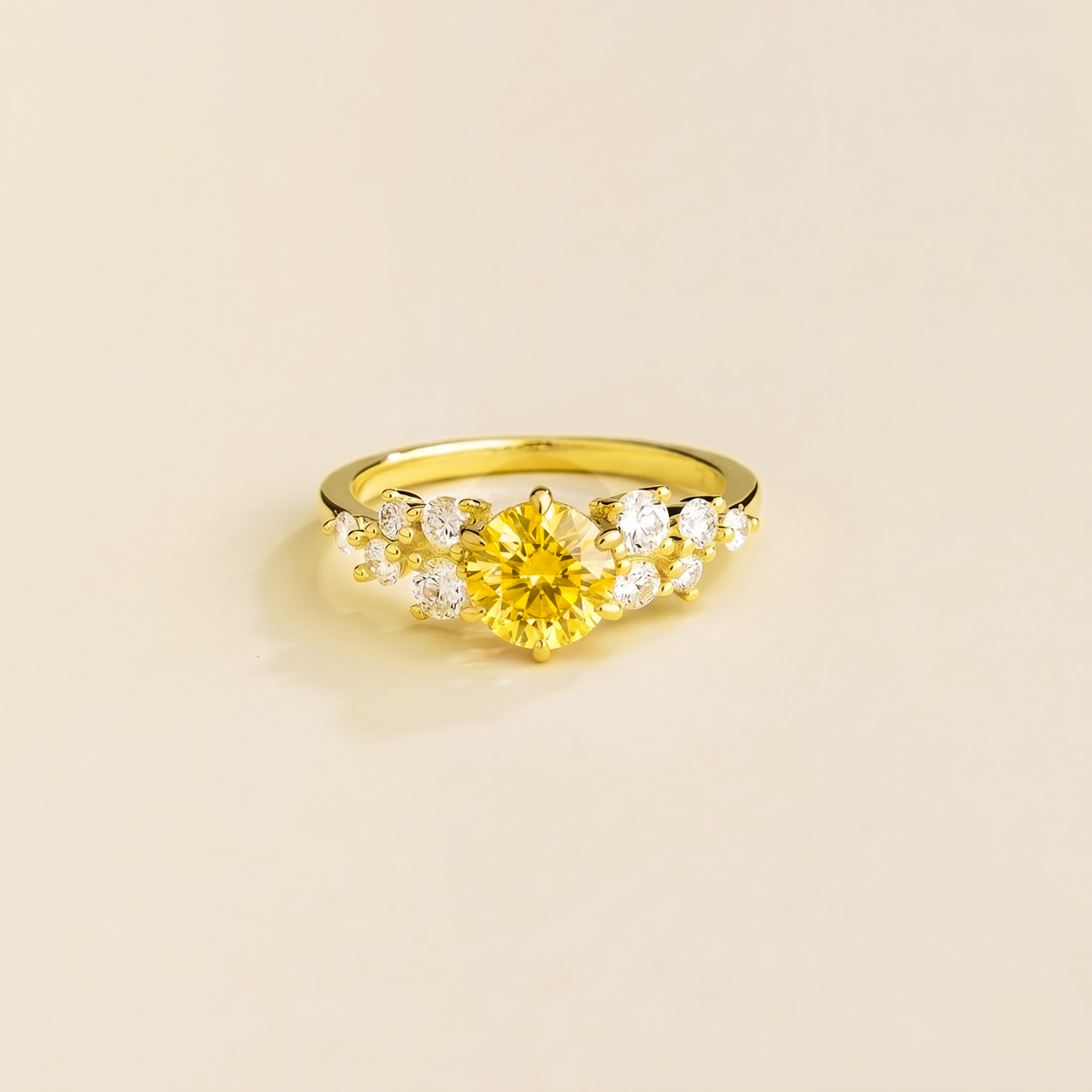 Floret round lab-grown yellow sapphire and diamond cluster ring in gold – front | Juvetti London