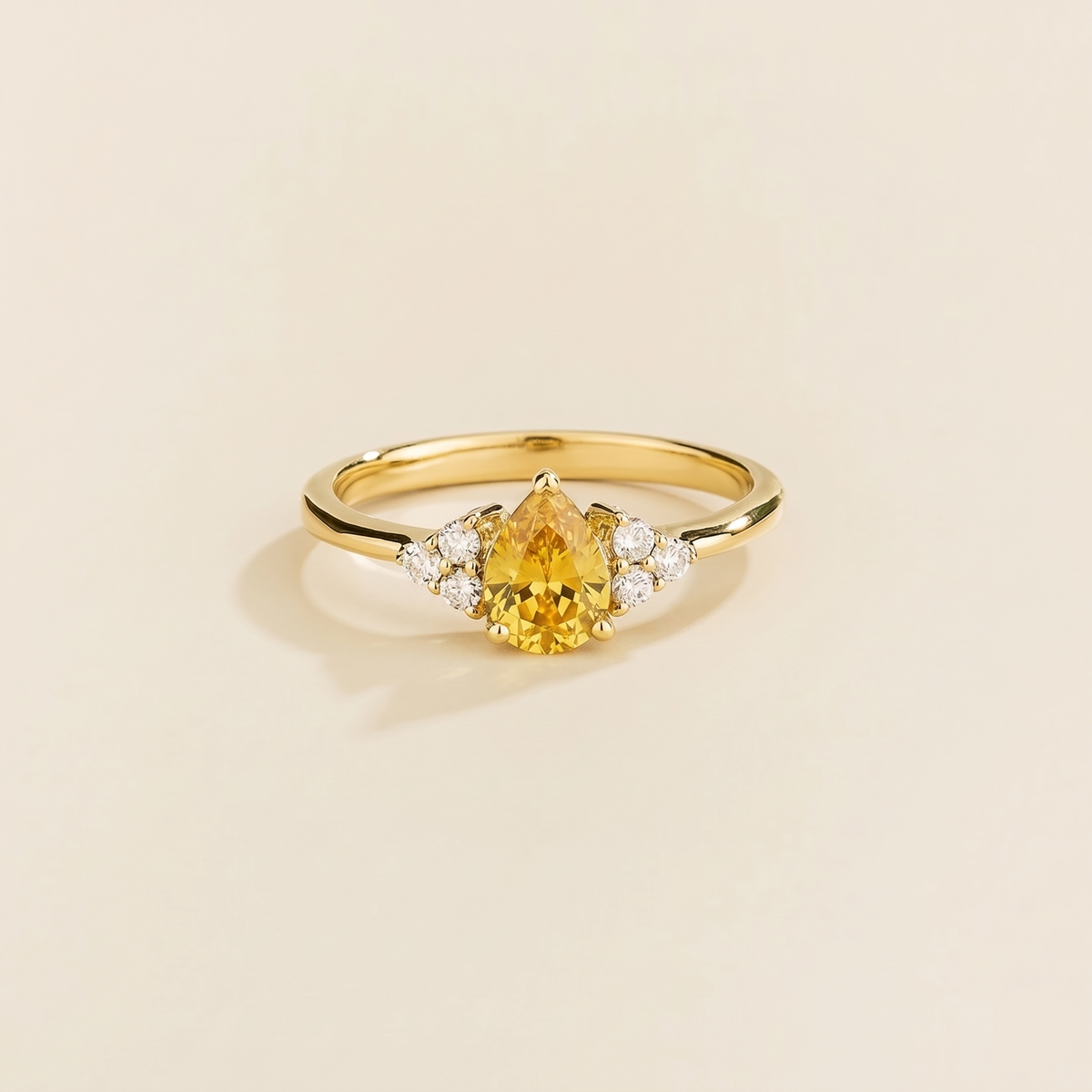 Pear-cut lab-grown yellow sapphire and diamond ring in gold – front view | Pisa by Juvetti