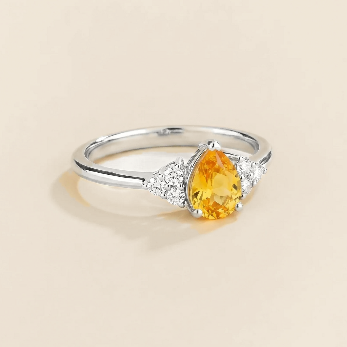 Pear-cut lab-grown yellow sapphire and diamond ring in white gold – side view | Pisa by Juvetti