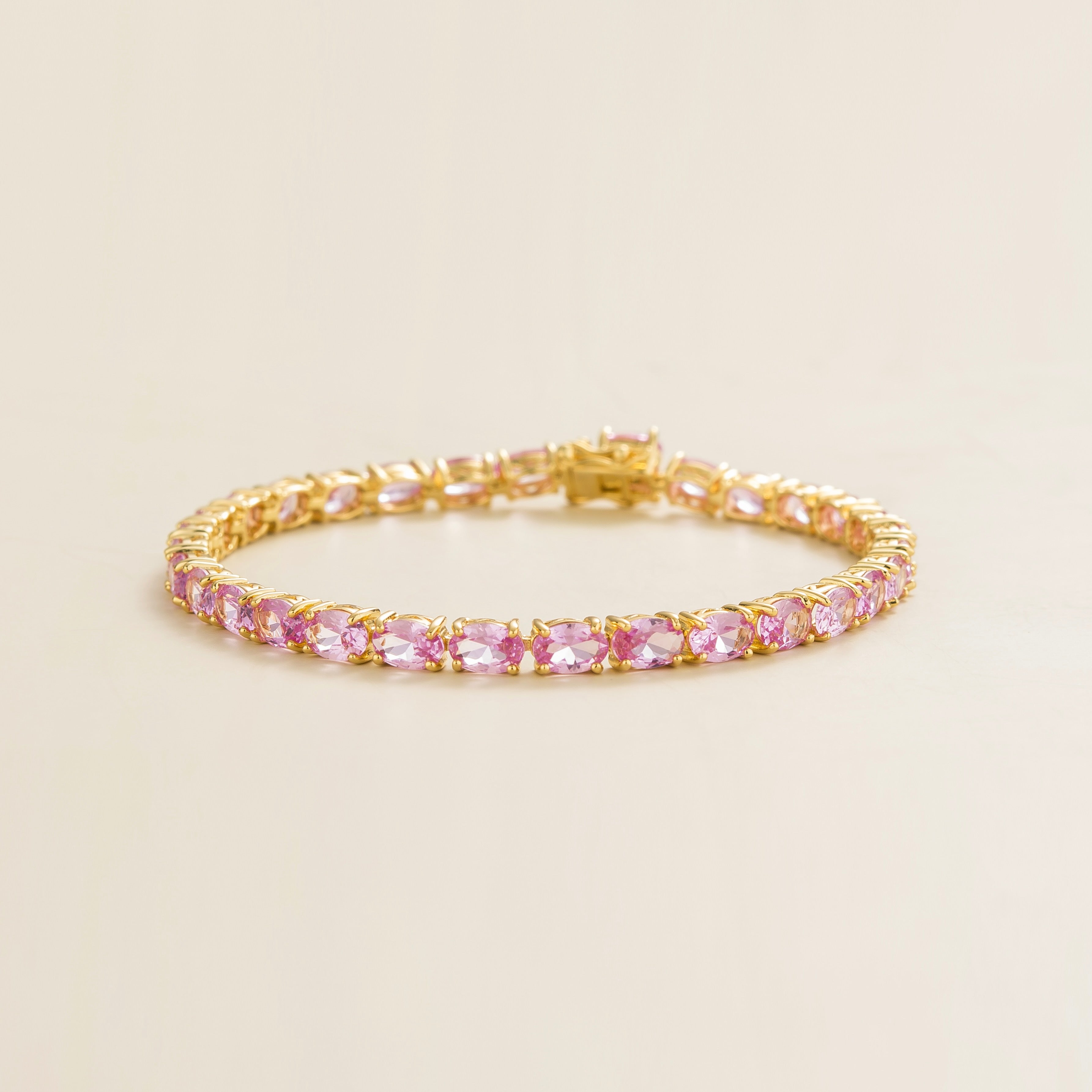 Salto Pastel Pink Sapphire Oval Tennis Bracelet in Gold