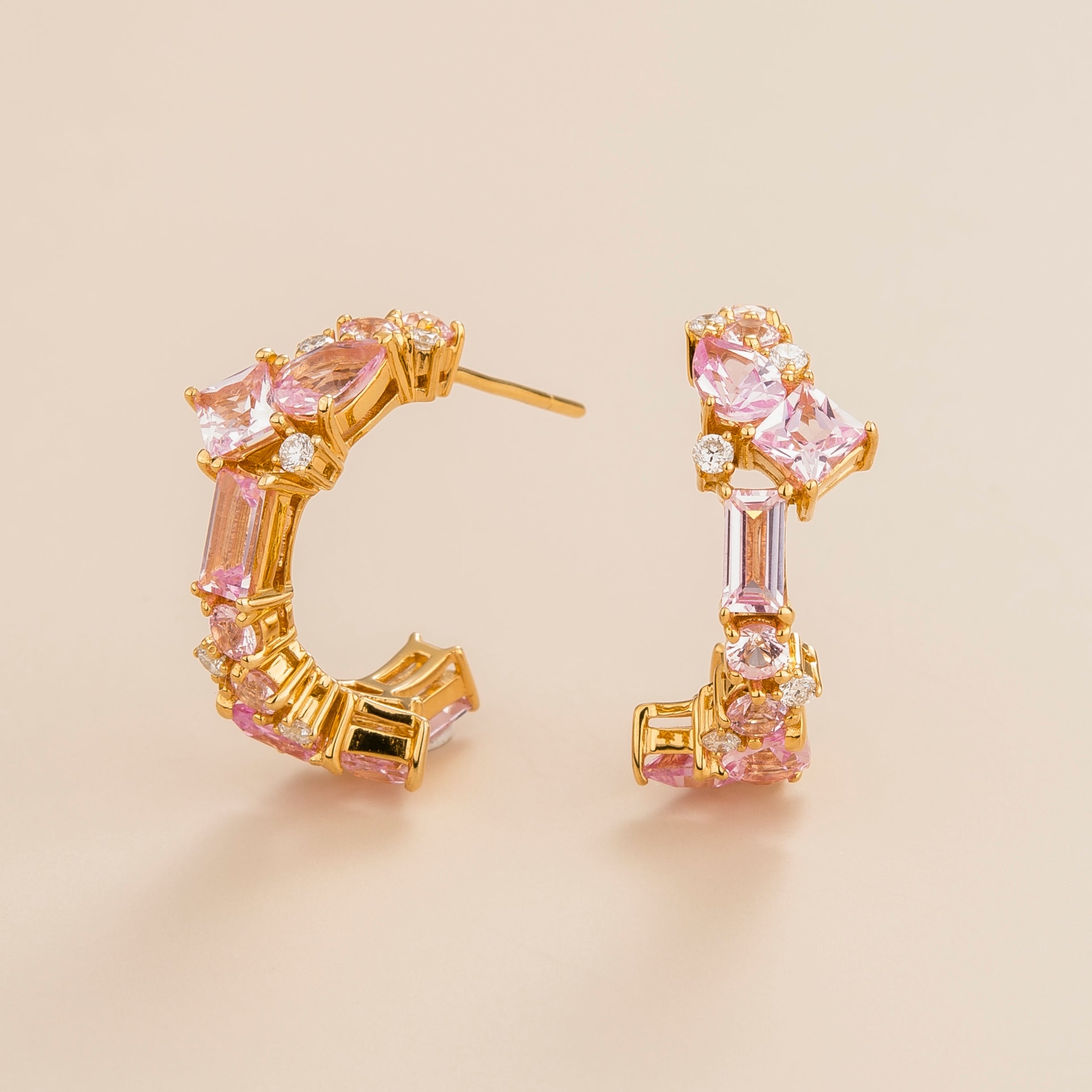 Lanna medium hoop earrings in 18k gold vermeil set with lab grown pink sapphire and diamond gem stones. Perfect for yourself and as gift.