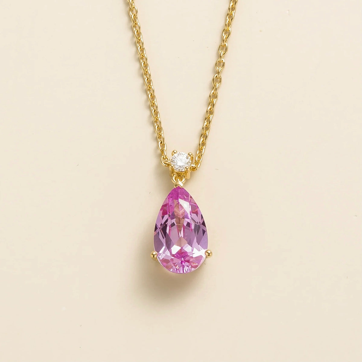 Lab-grown pink sapphire and diamond pear drop pendant necklace in gold, large – front view | Pisa by Juvetti