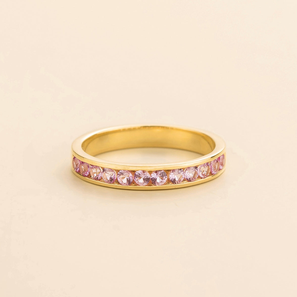 Margo Pink Sapphire Channel Set Half Eternity Ring in Gold